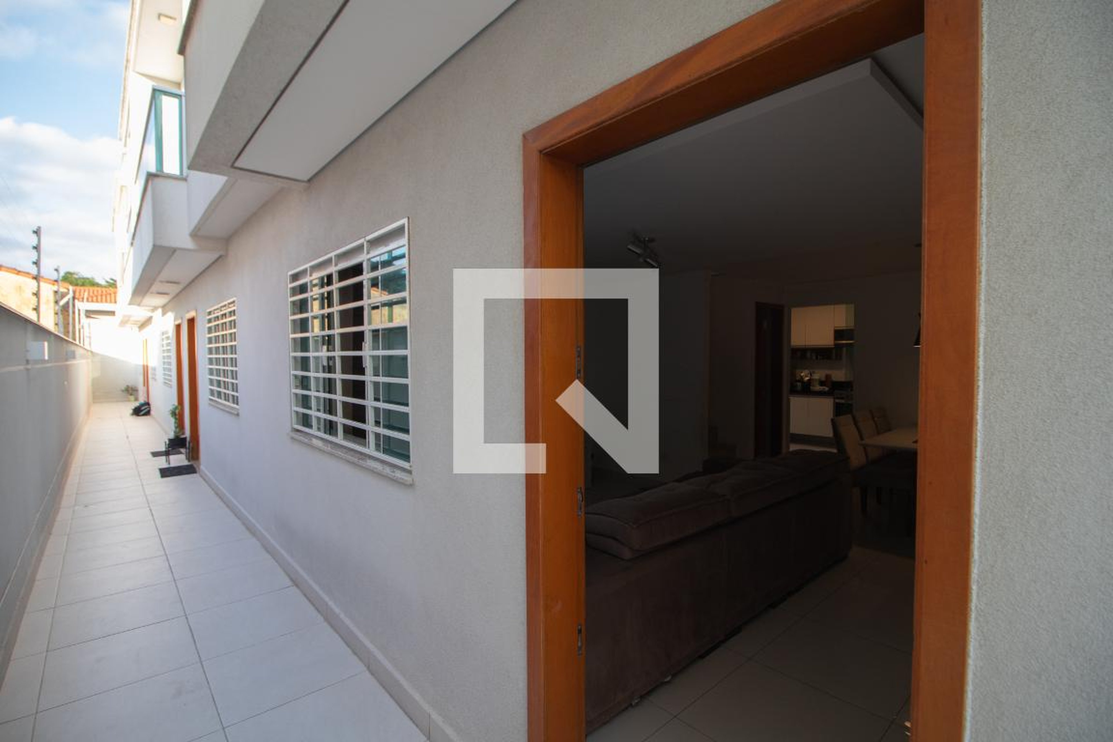 Entrada Condomínio em Rua Álvares Afonso, 21