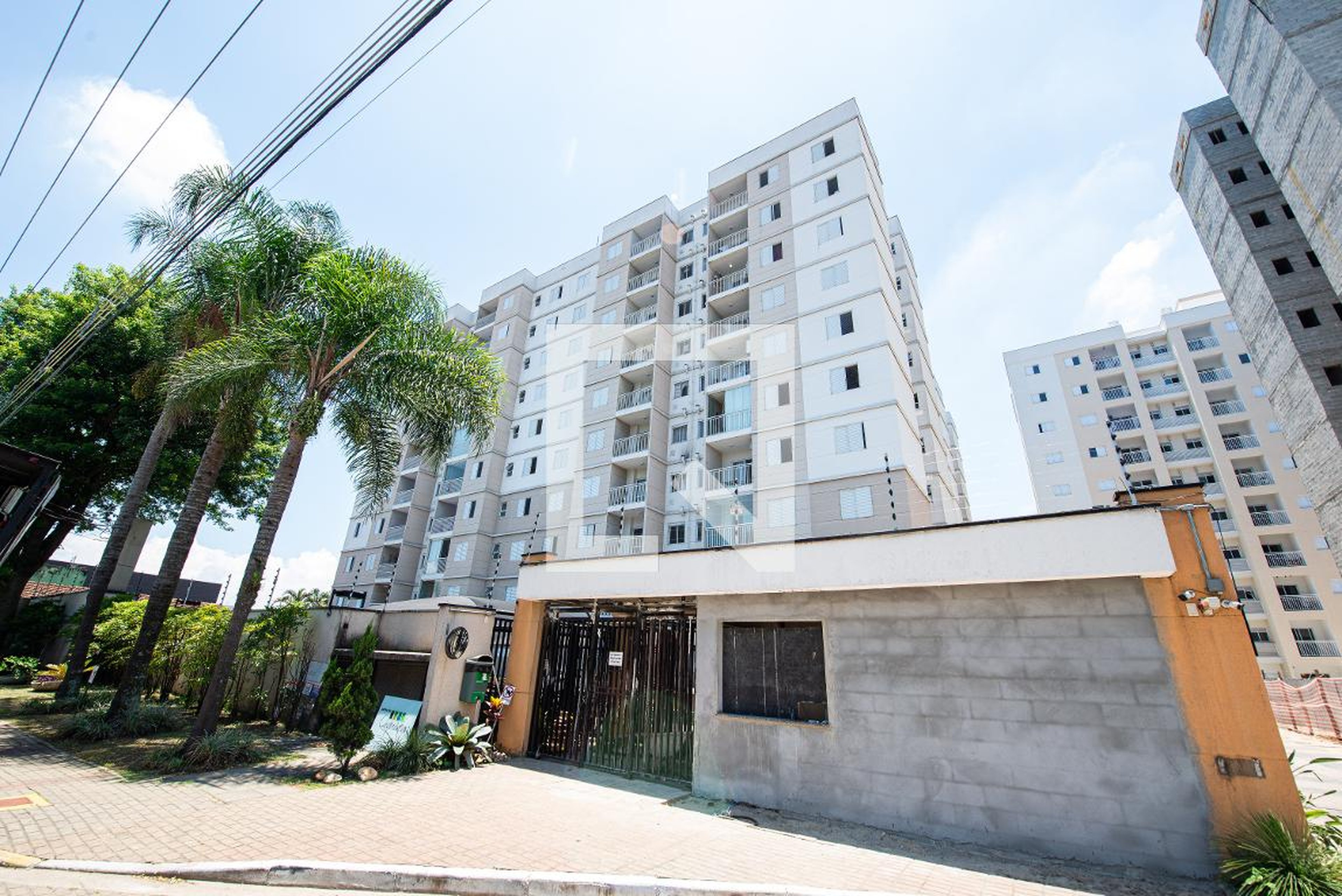 Fachada do Condomínio Condomínio Jardim das Orquideas