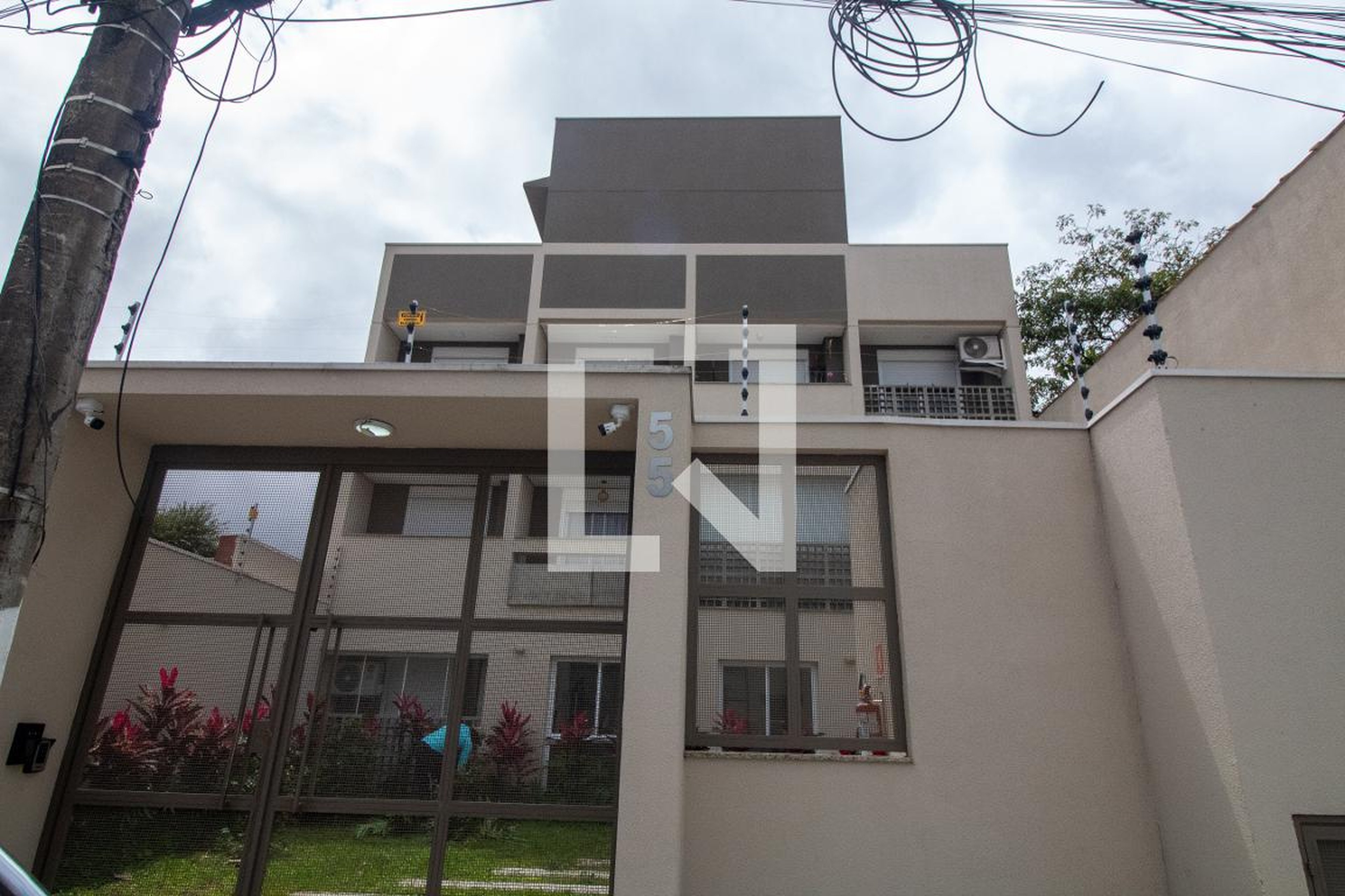 Fachada Condomínio em Rua Afonso José de Carvalho, 50