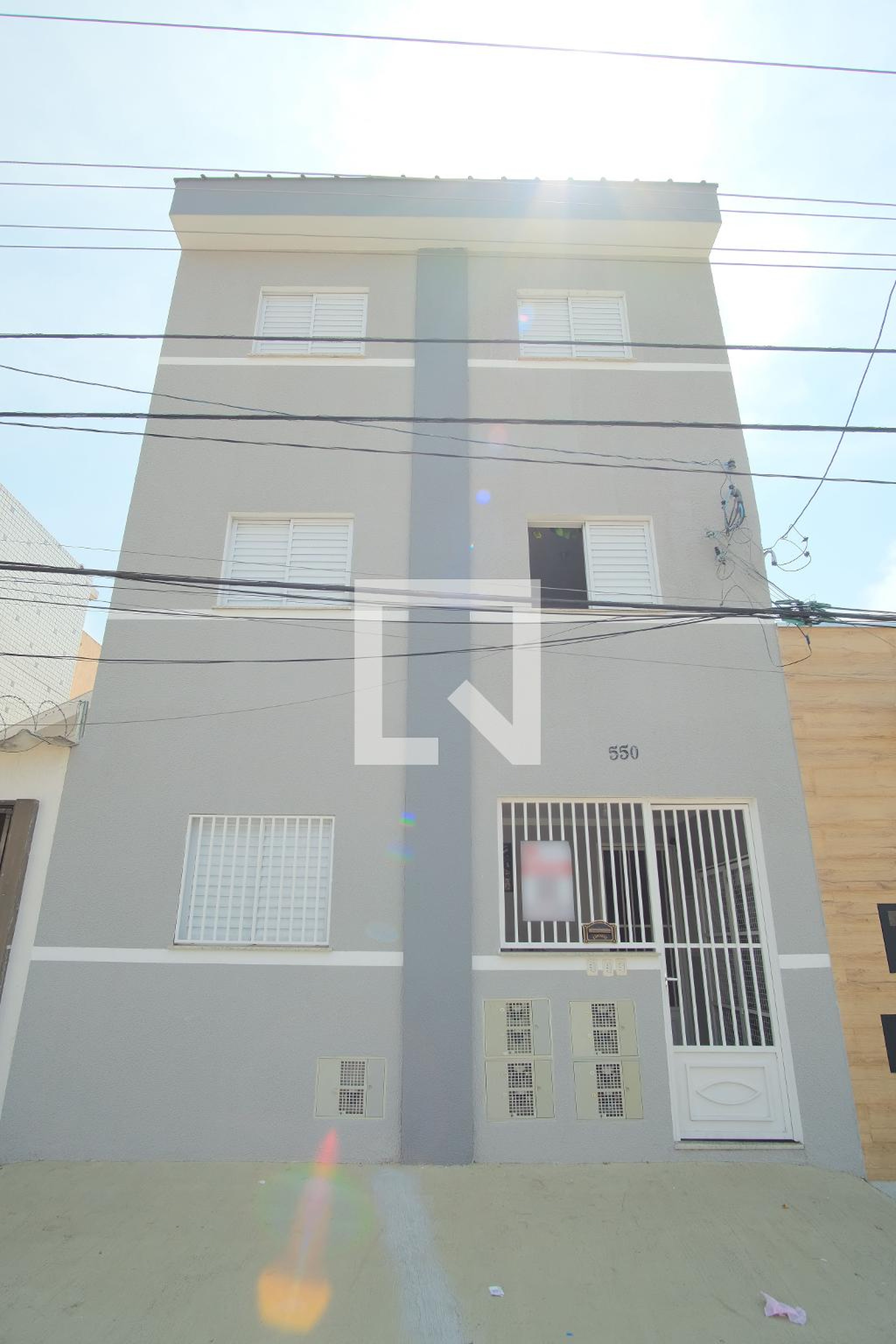 Fachada Condomínio em Rua Santo Elias, 550