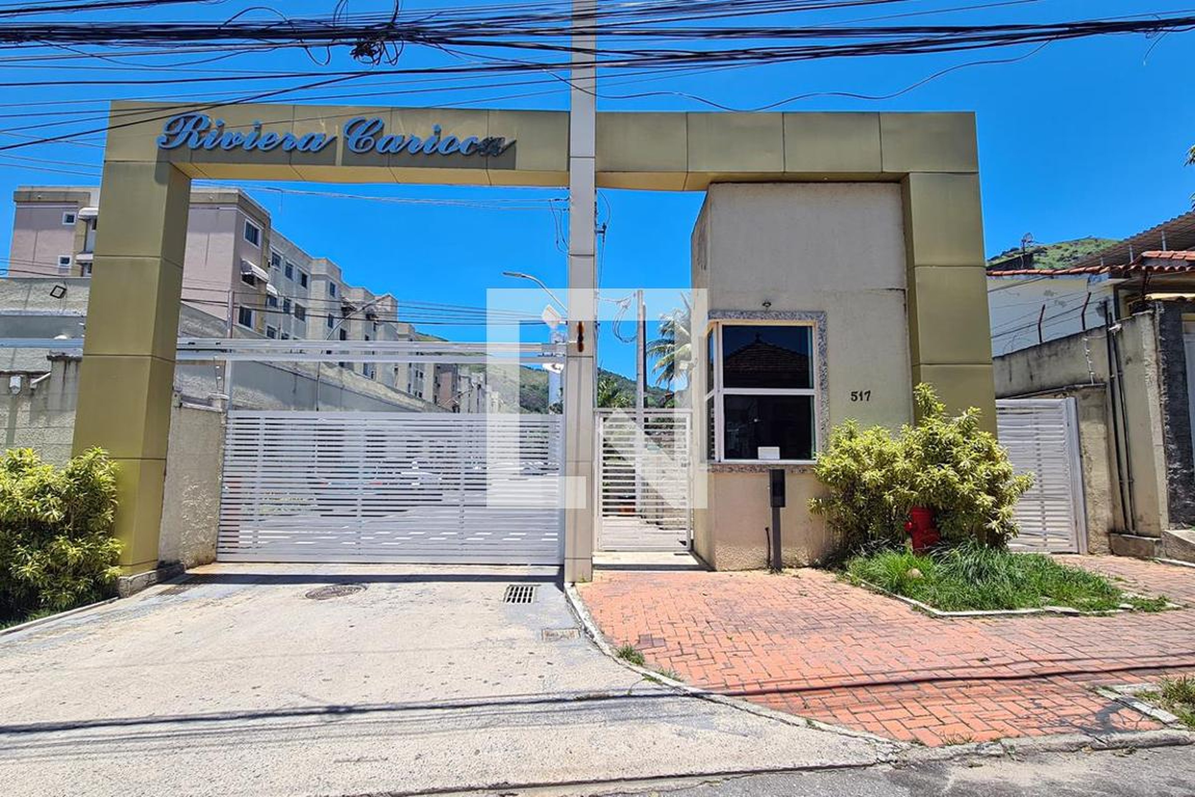 Fachada do Condomínio Condomínio Riviera Carioca