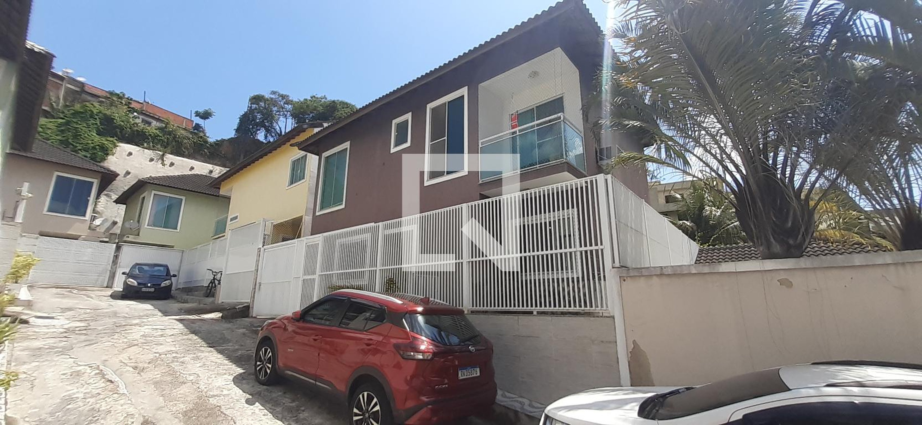 Fachada Condomínio em Rua Zoroastro Pamplona, 364