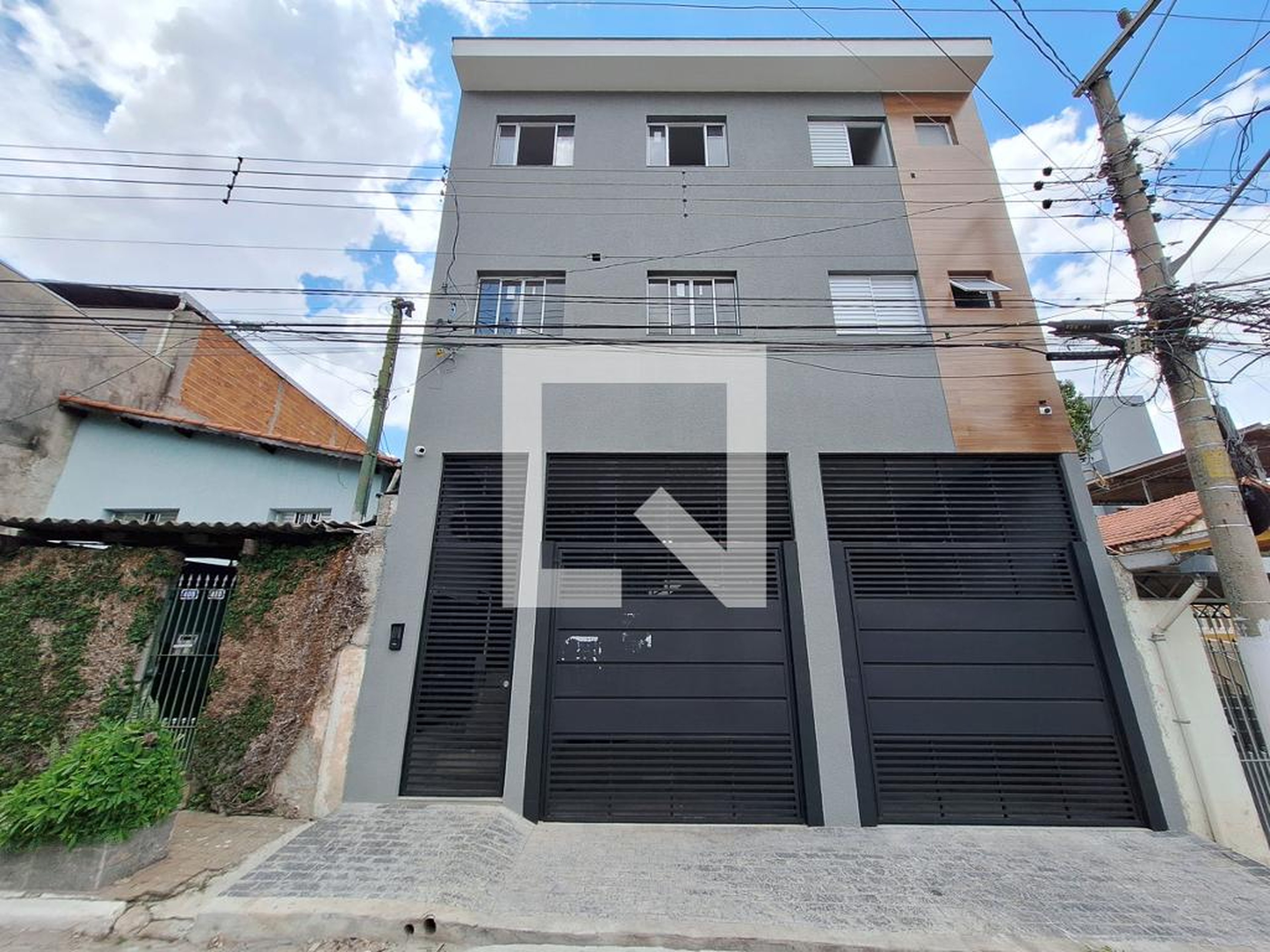 Fachada Condomínio em Rua Pedro Osório Filho, 404