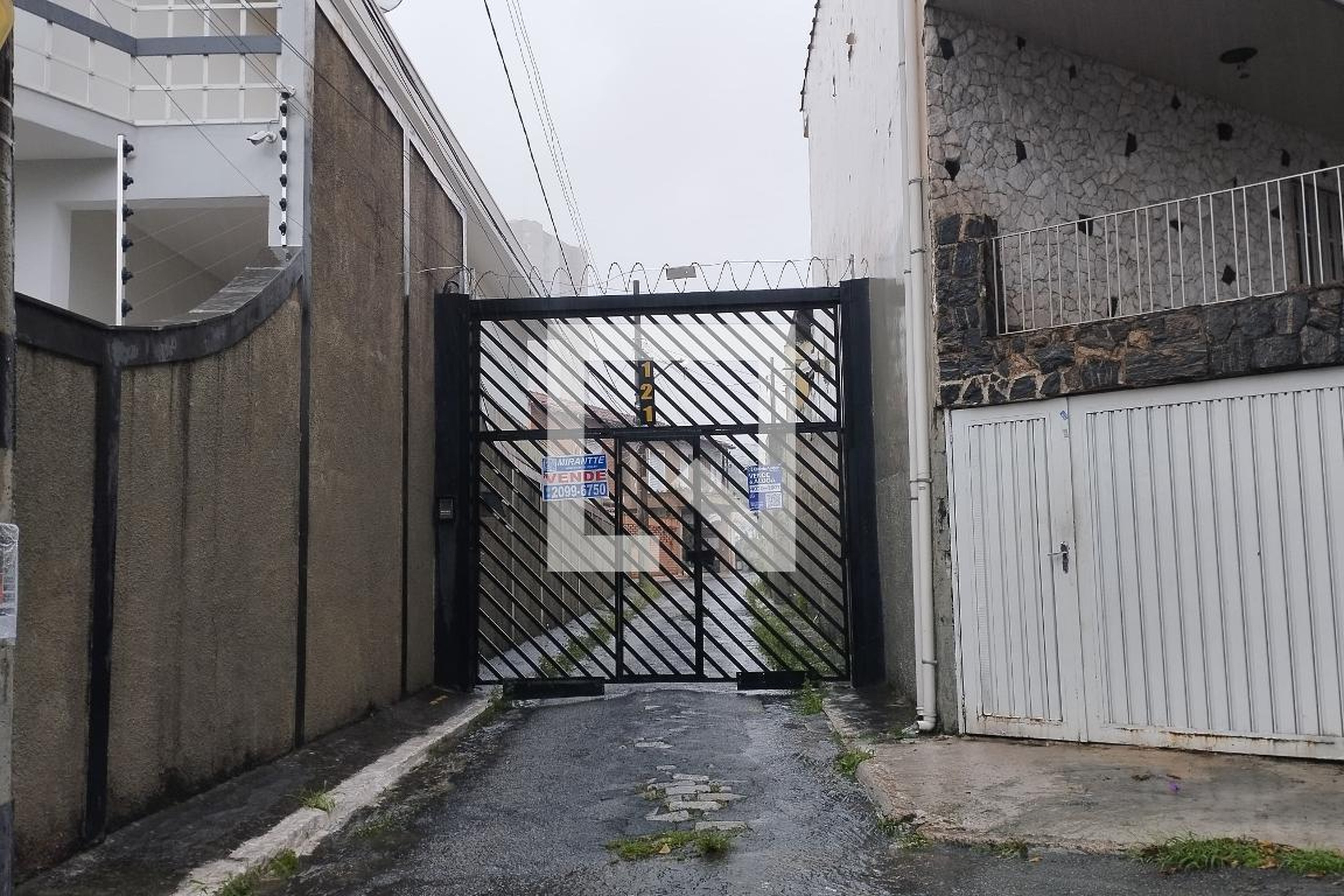 Fachada Condomínio em Rua Agente Gomes, 121