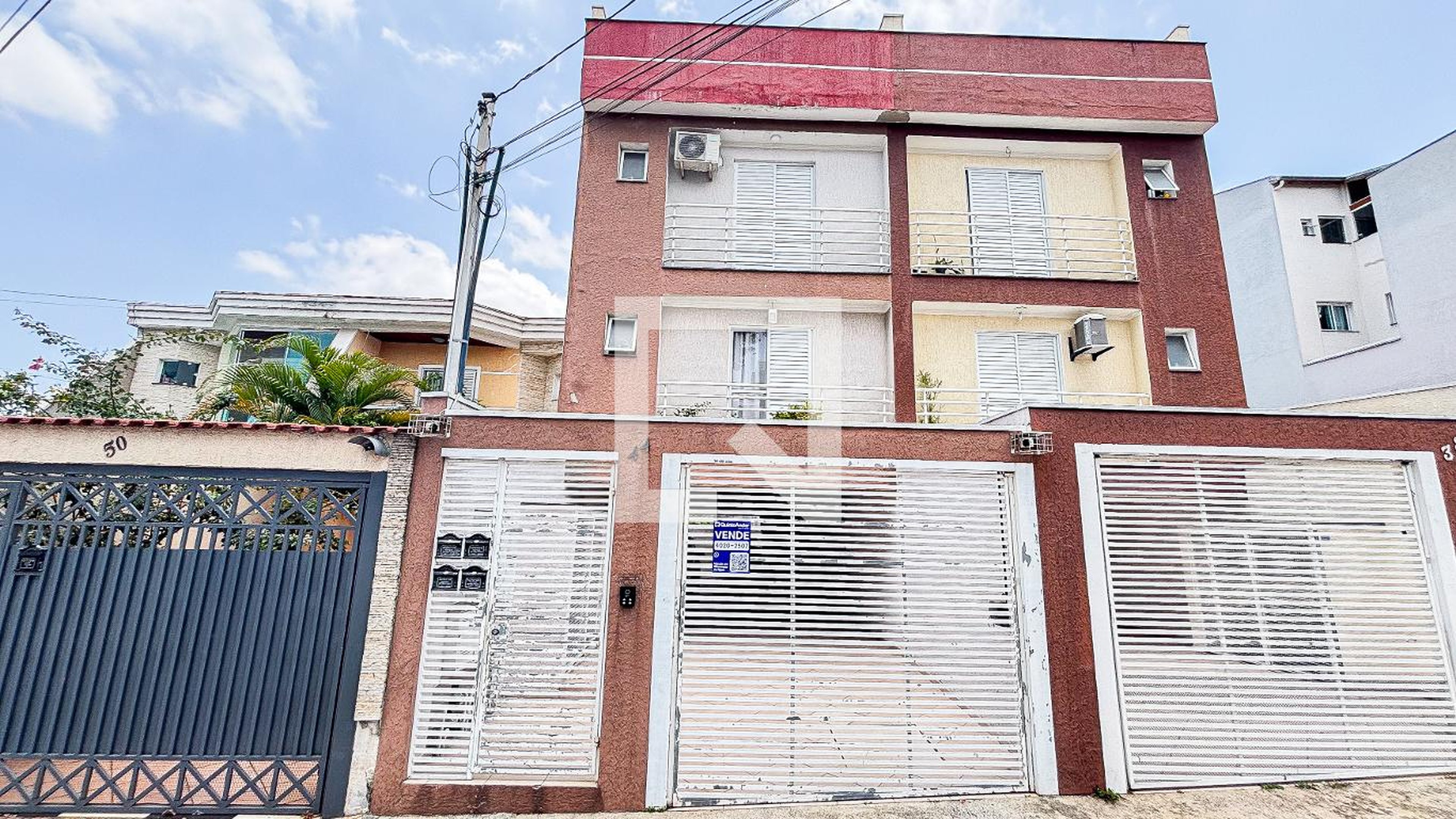 Fachada Condomínio em Rua Matias da Cunha, 44