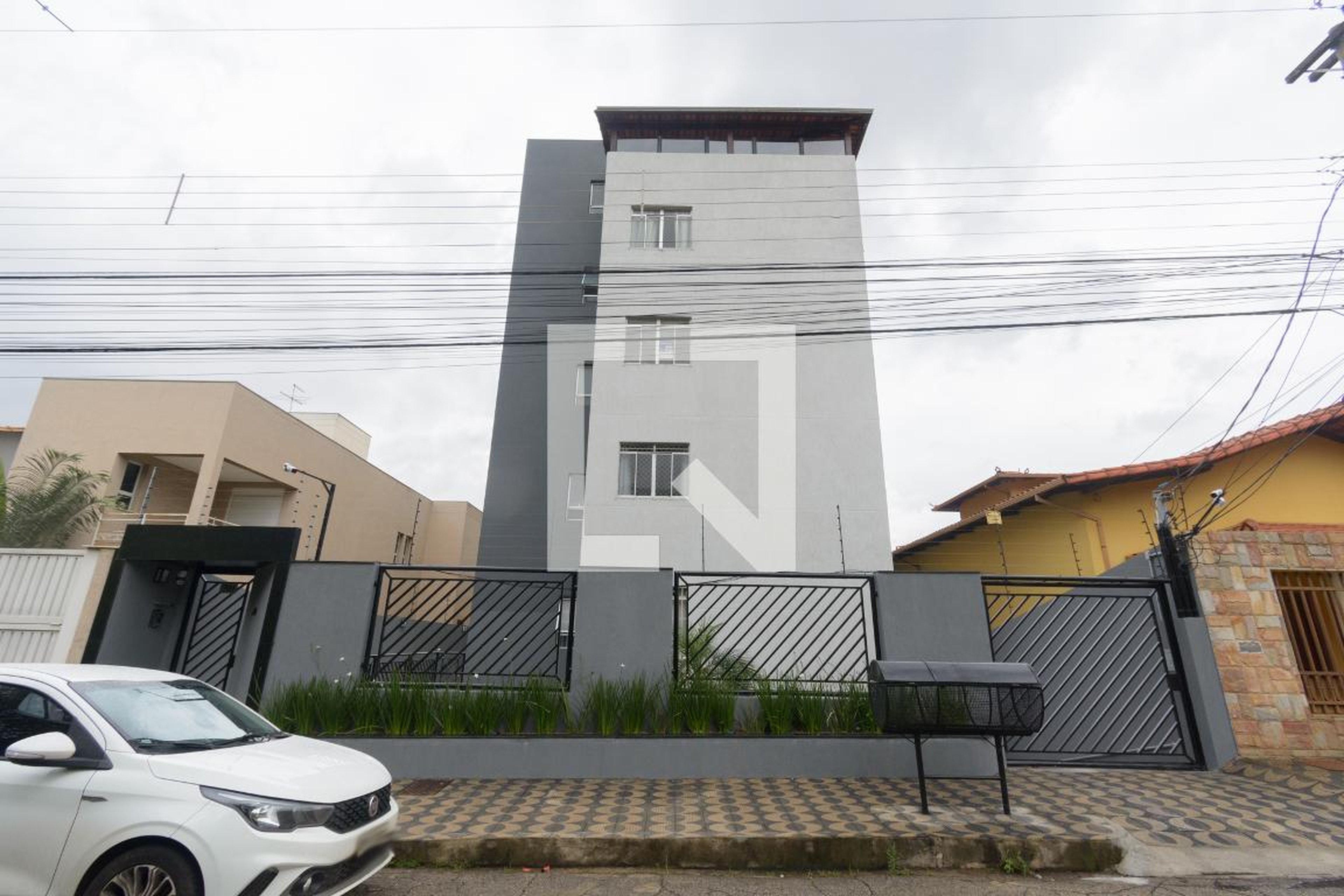 Fachada Condomínio em Rua Andrômeda, 701