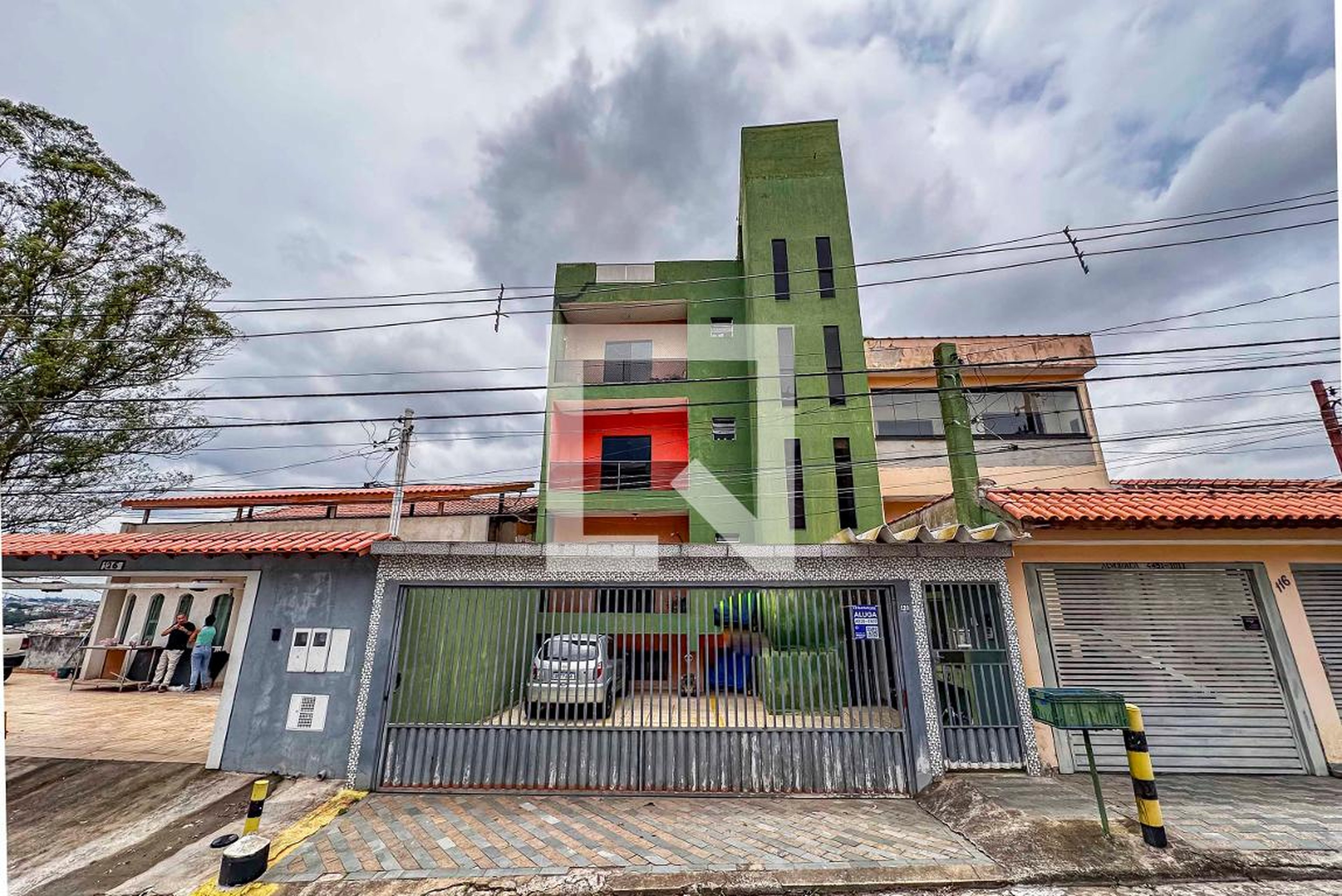 Fachada Condomínio em Rua Heron Domingues, 120