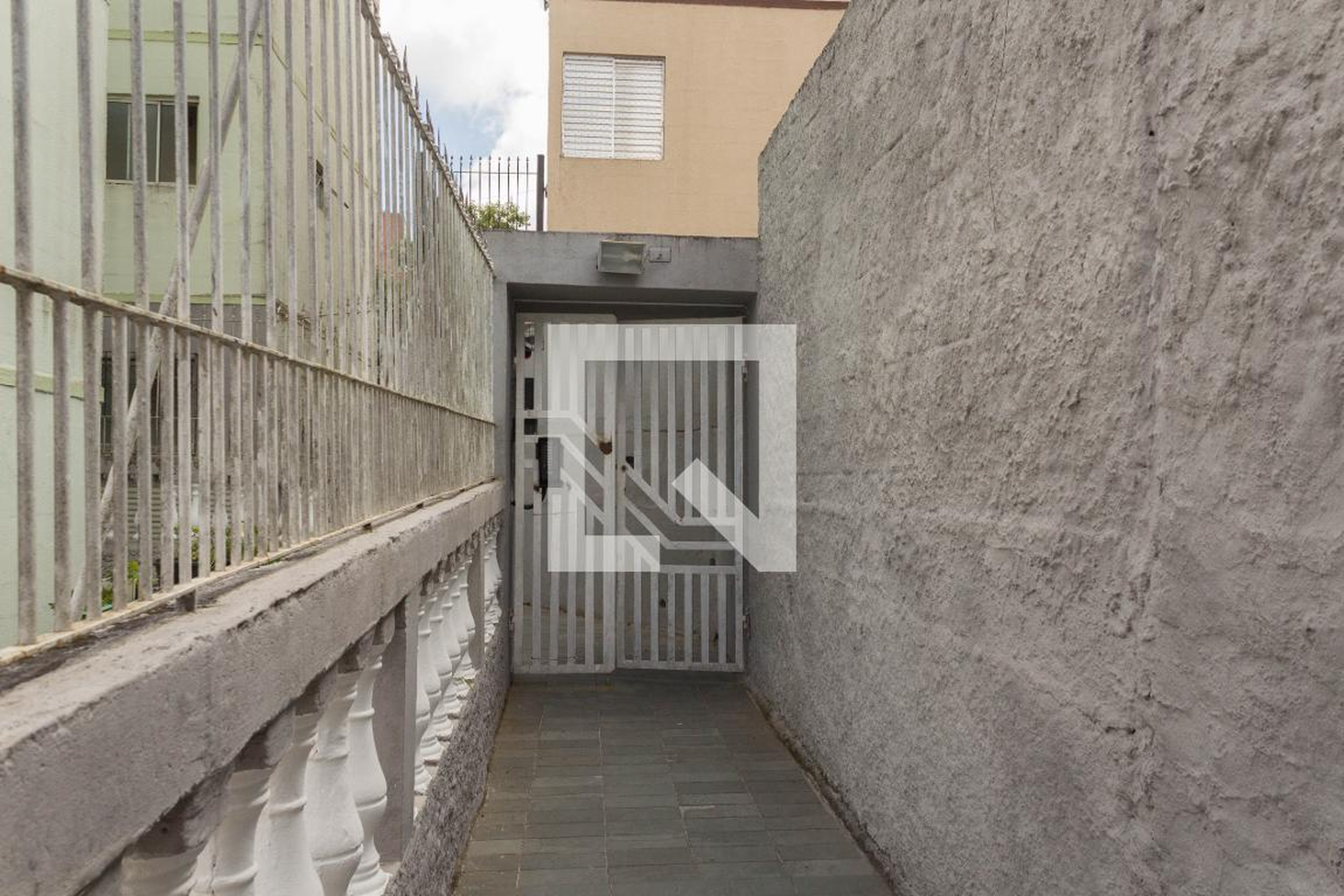 Fachada Condomínio em Rua Alfredo Scarpelli, 61