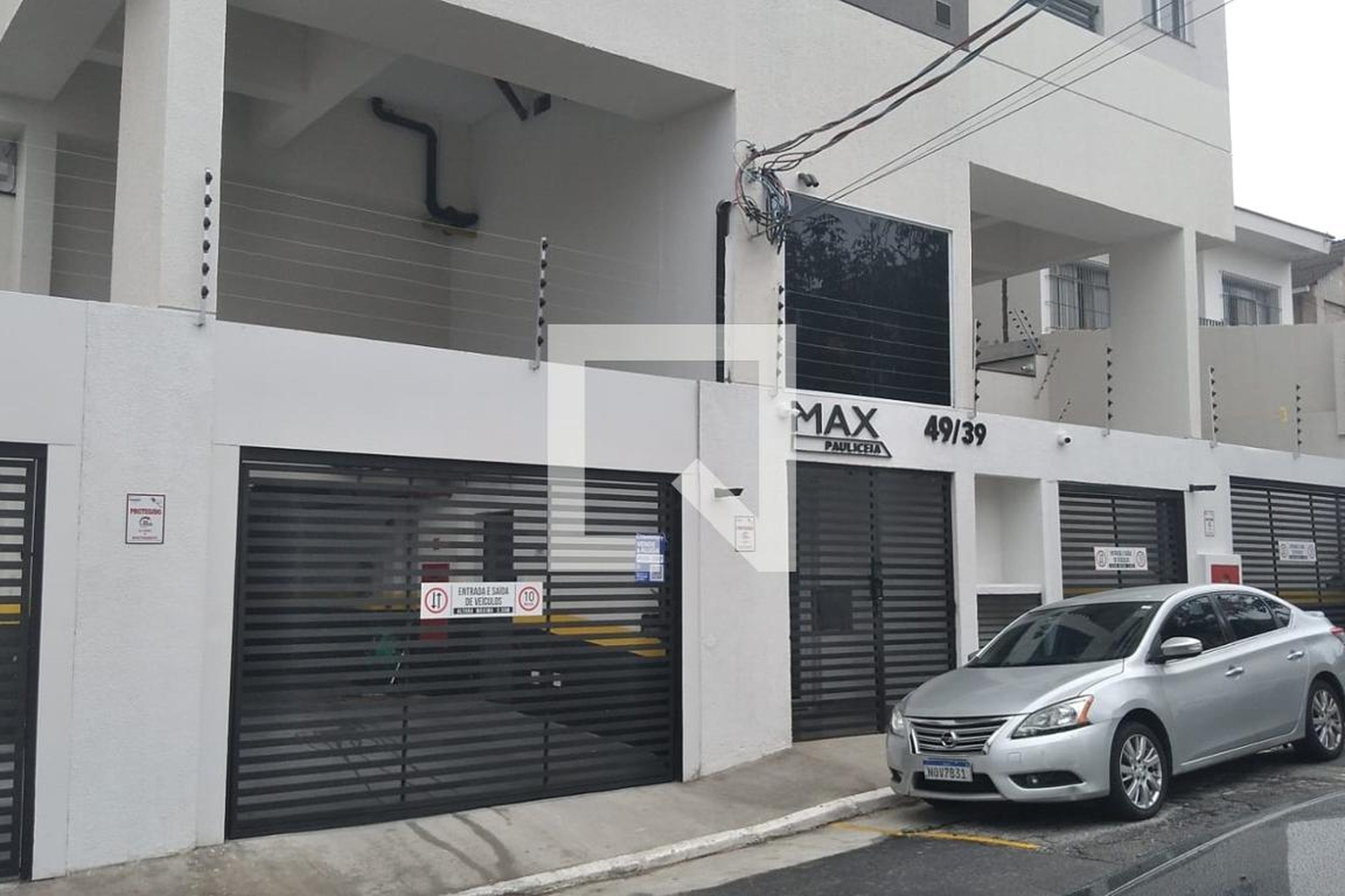 Fachada Condomínio em Rua Júlia Lopes de Almeida, 39