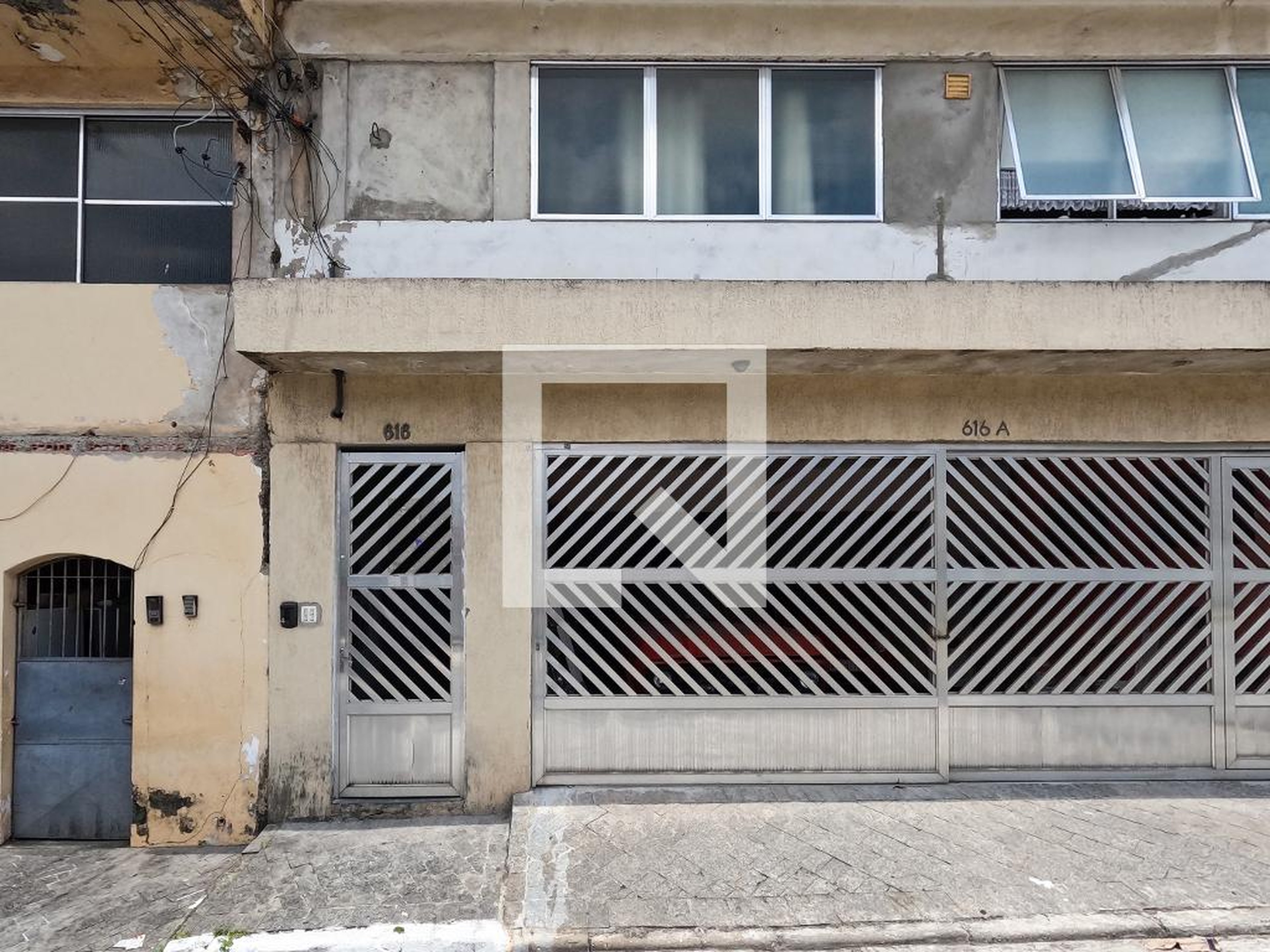 Fachada Condomínio em Rua Julião Ferreira da Silva, 616