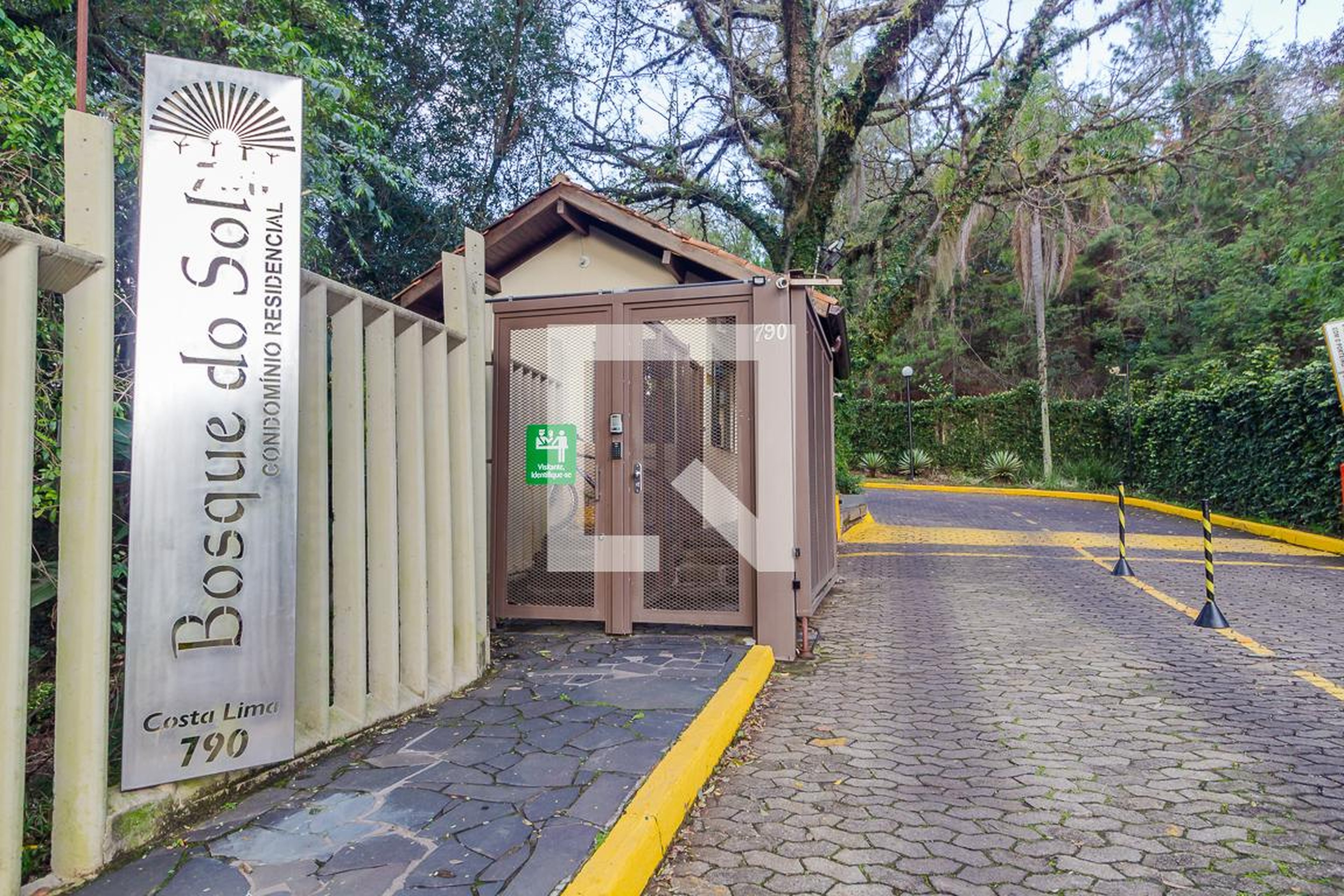 Fachada do condomínio Condomínio Bosque do Sol