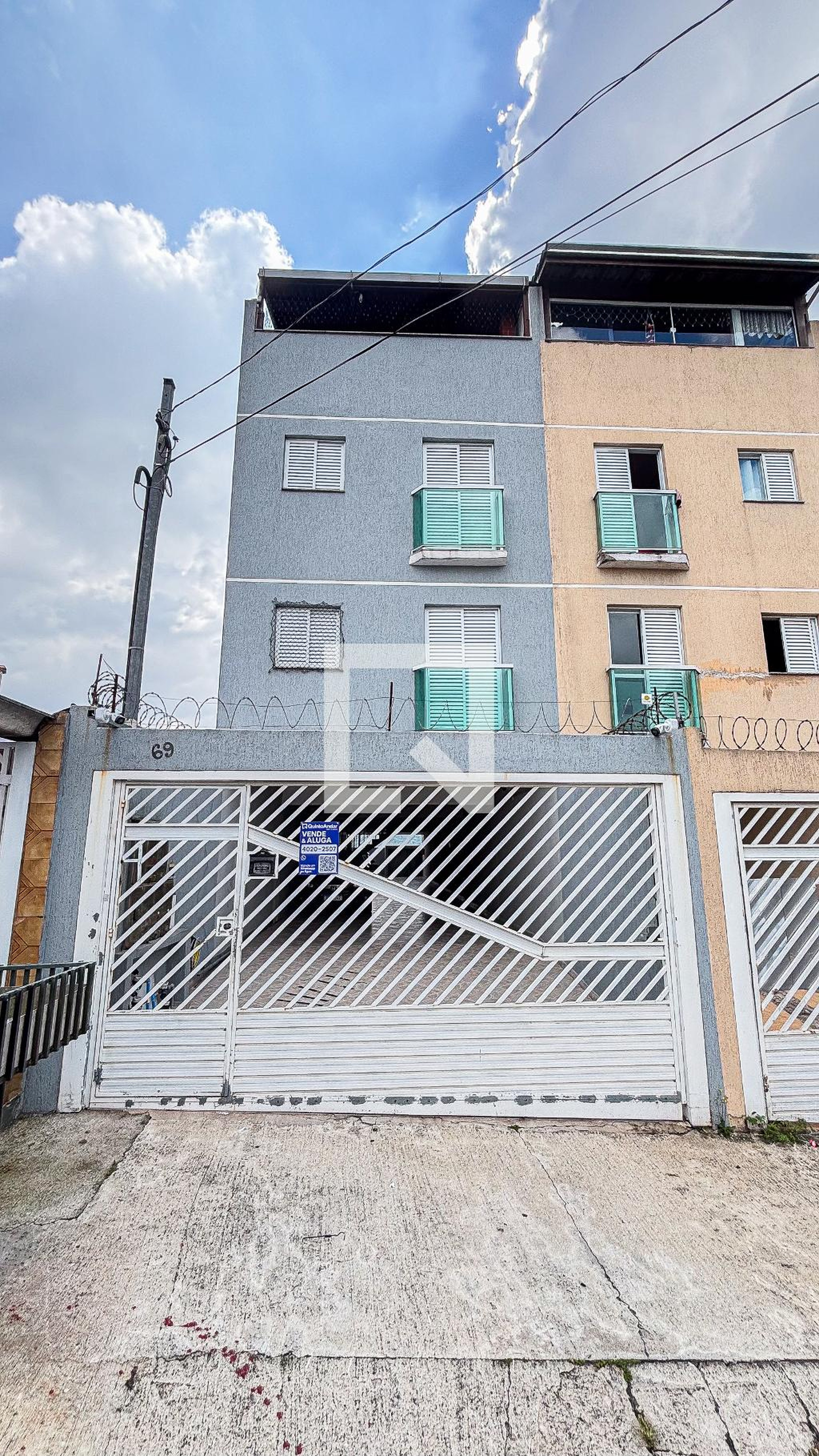 Fachada Condomínio em Rua Biguá, 69