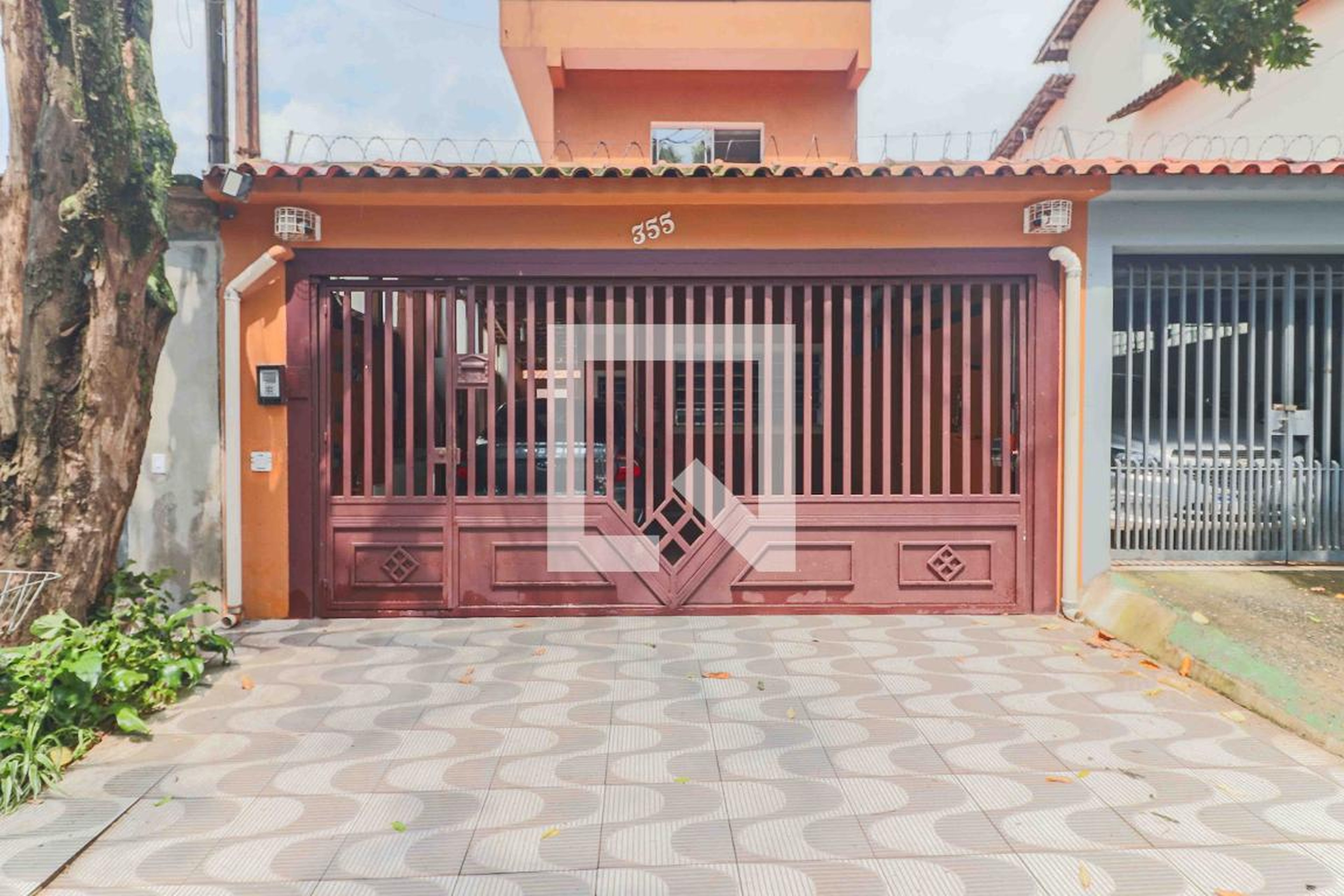 Fachada Condomínio em Rua Gertrudes Cunha, 355