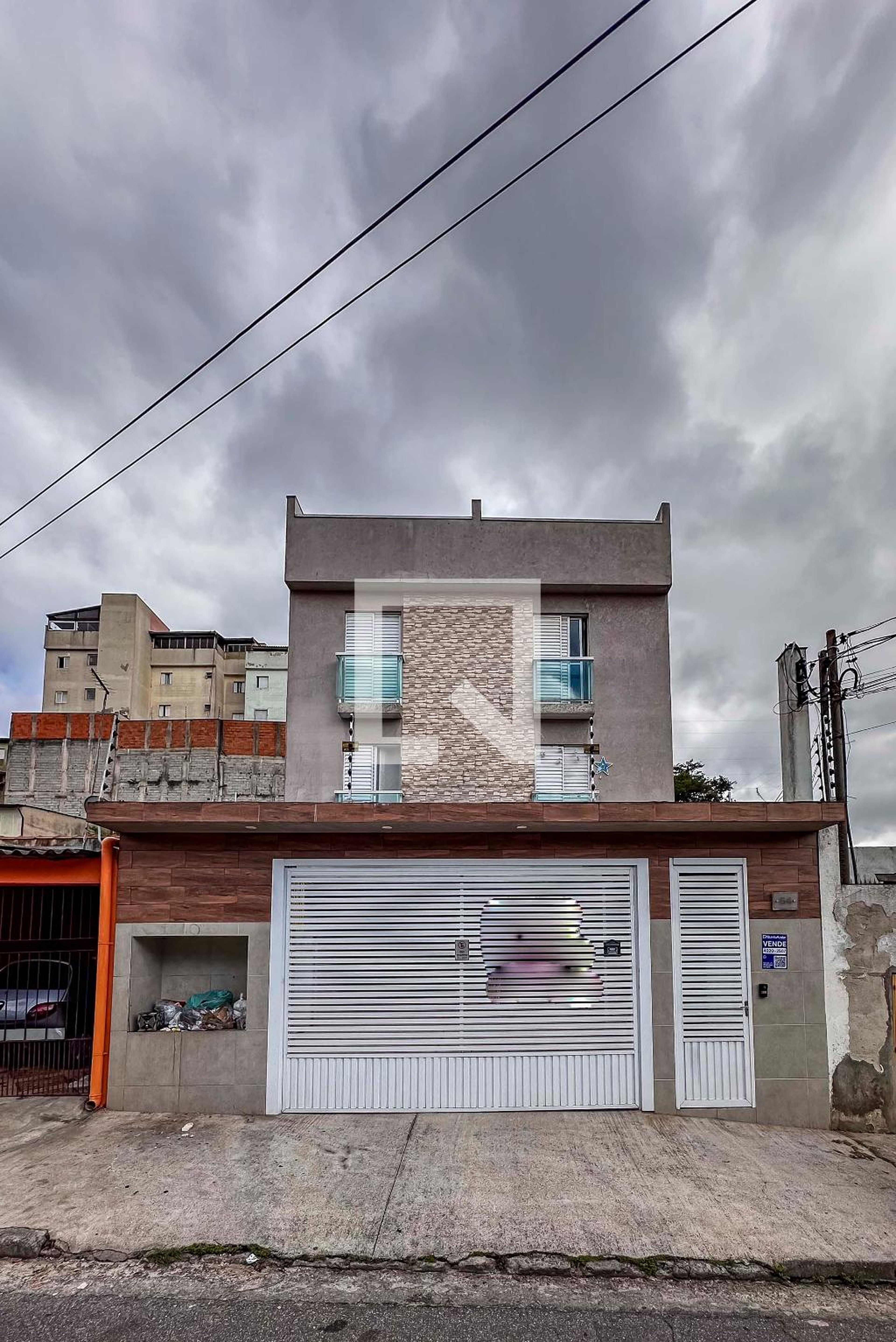 Fachada Condomínio em Rua Antônio Corrêa, 64