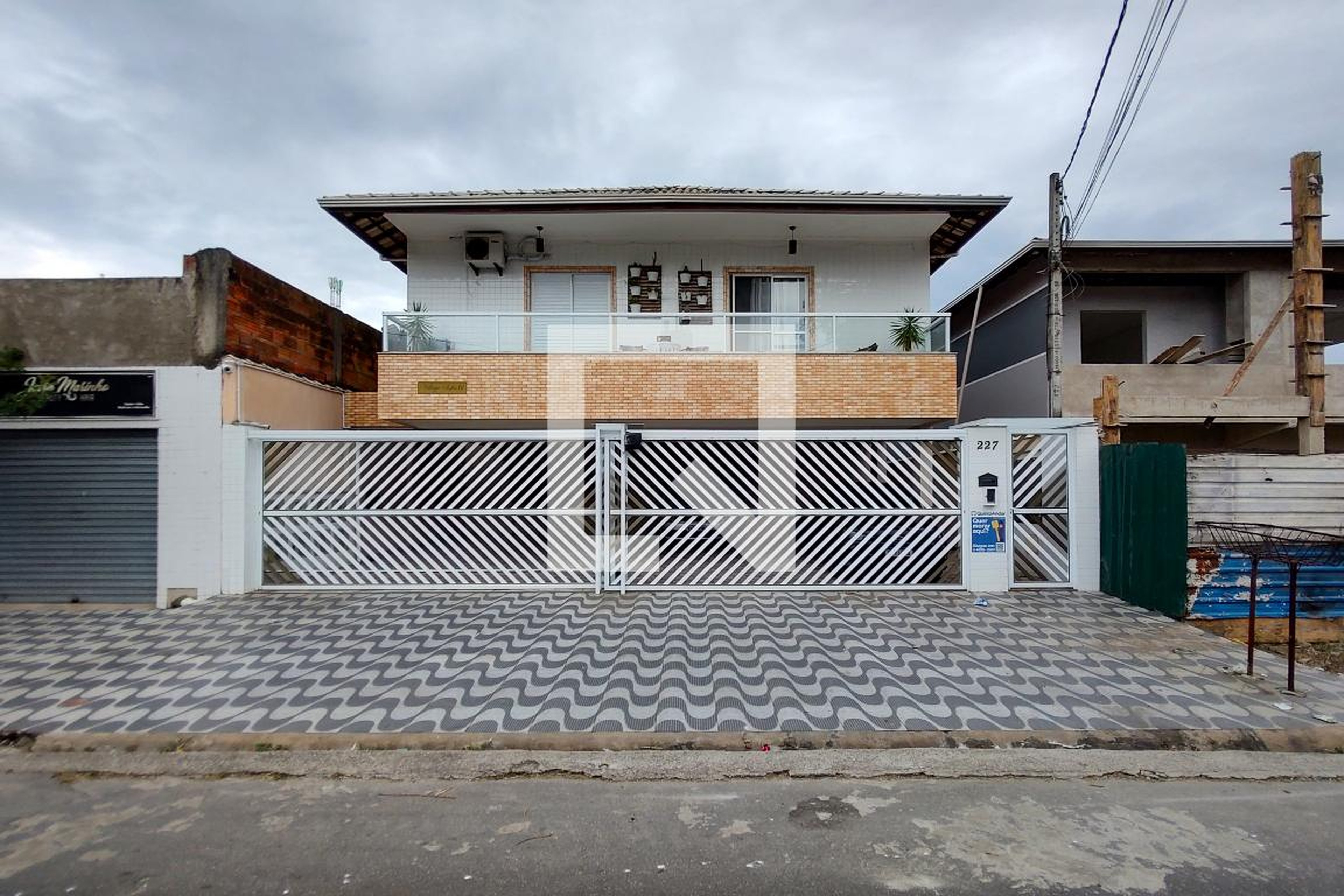 Fachada Condomínio em Rua Ubaldo Pinto, 227