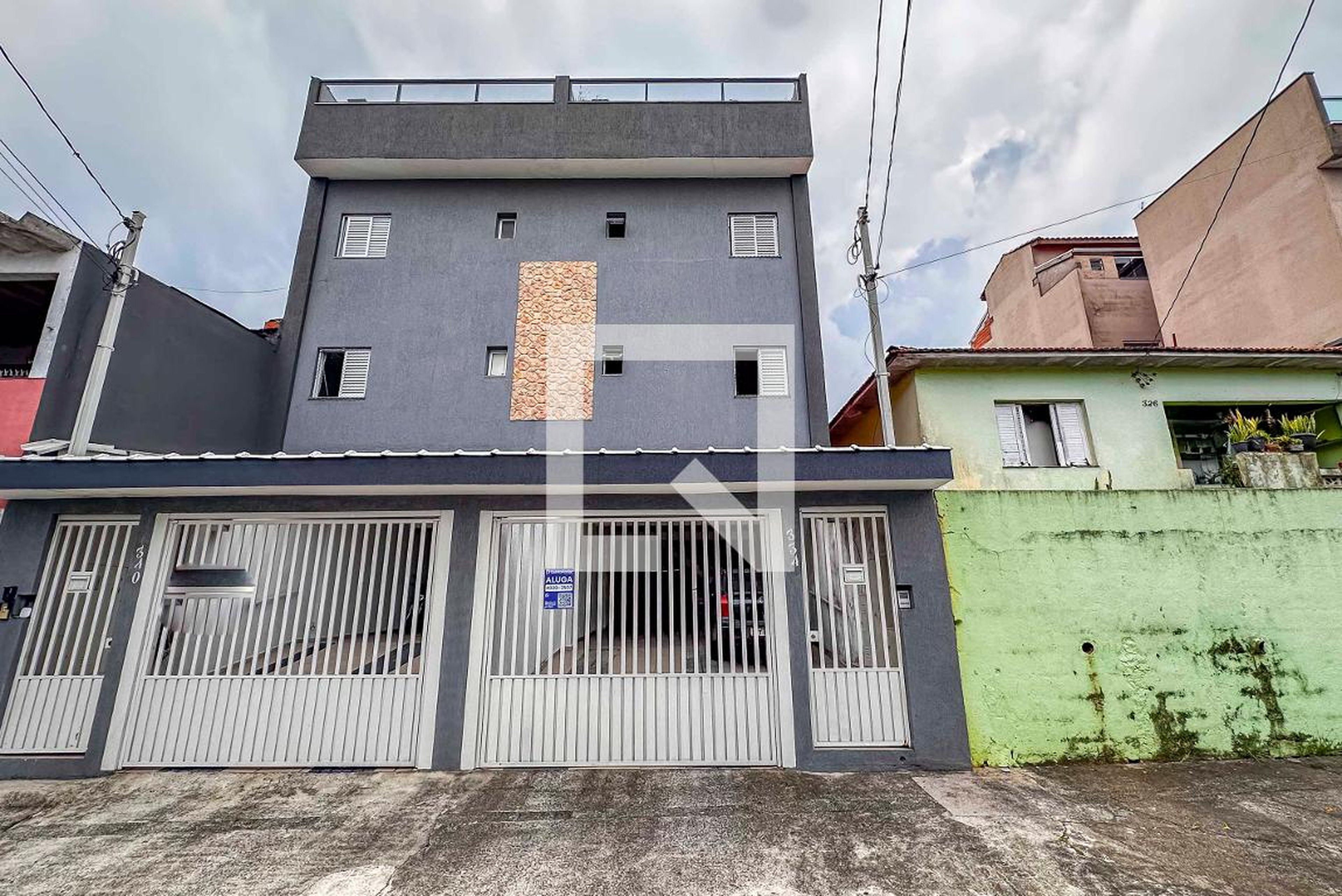 Fachada Condomínio em Rua Dias da Silva, 334