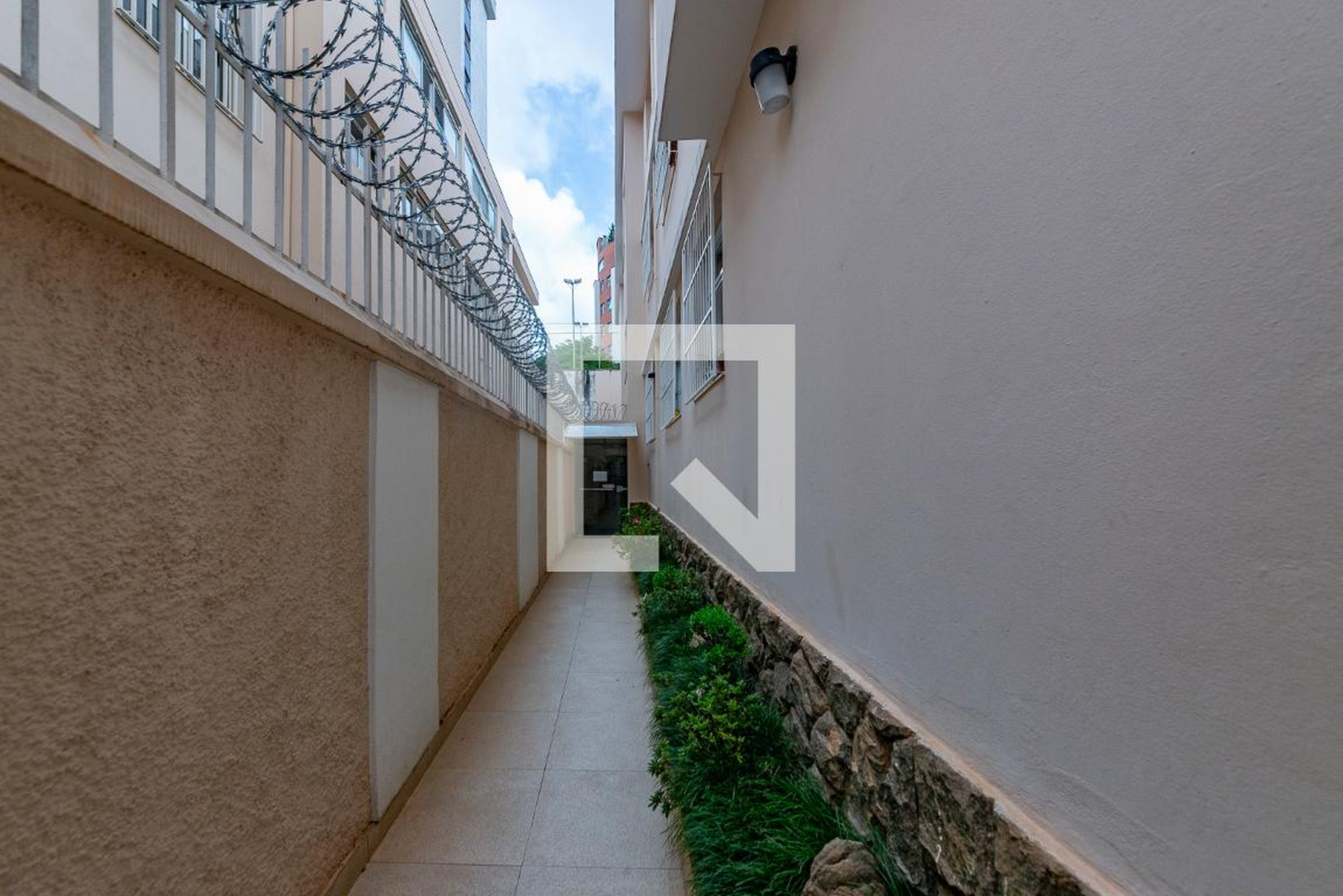 Entrada Condomínio em Rua Cassiporé, 70