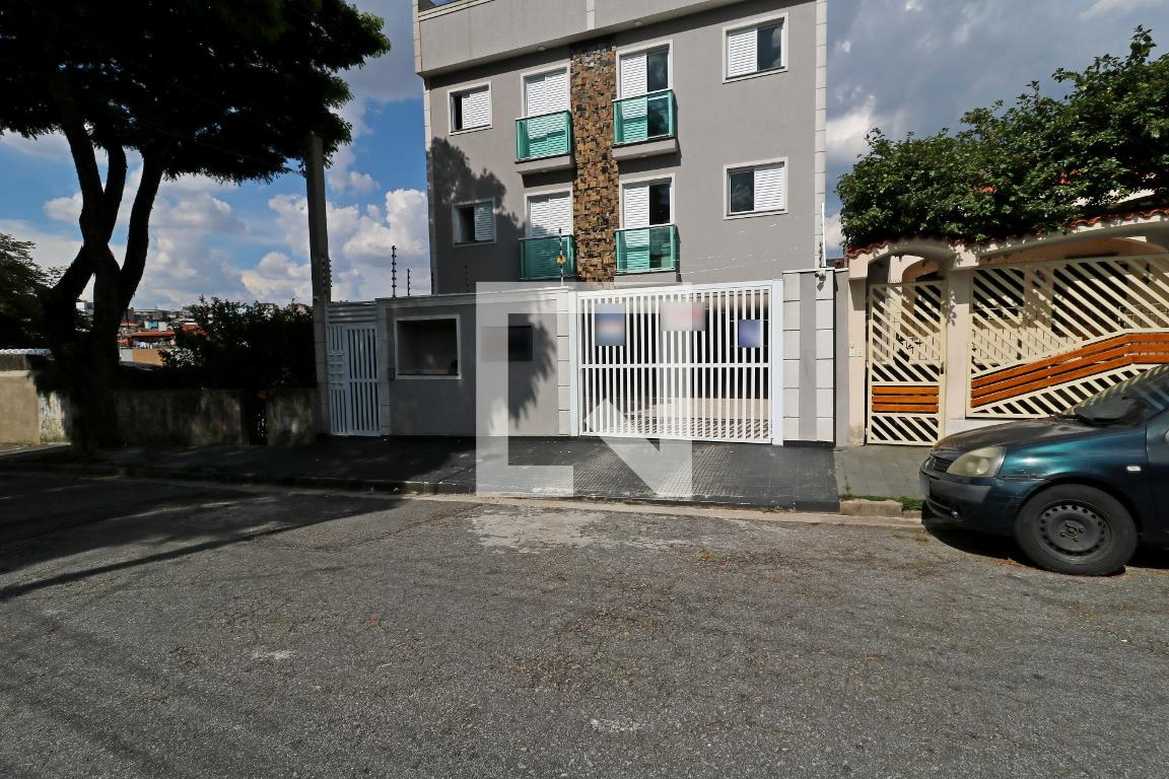 Fachada Condomínio em Rua Tumiaru, 137