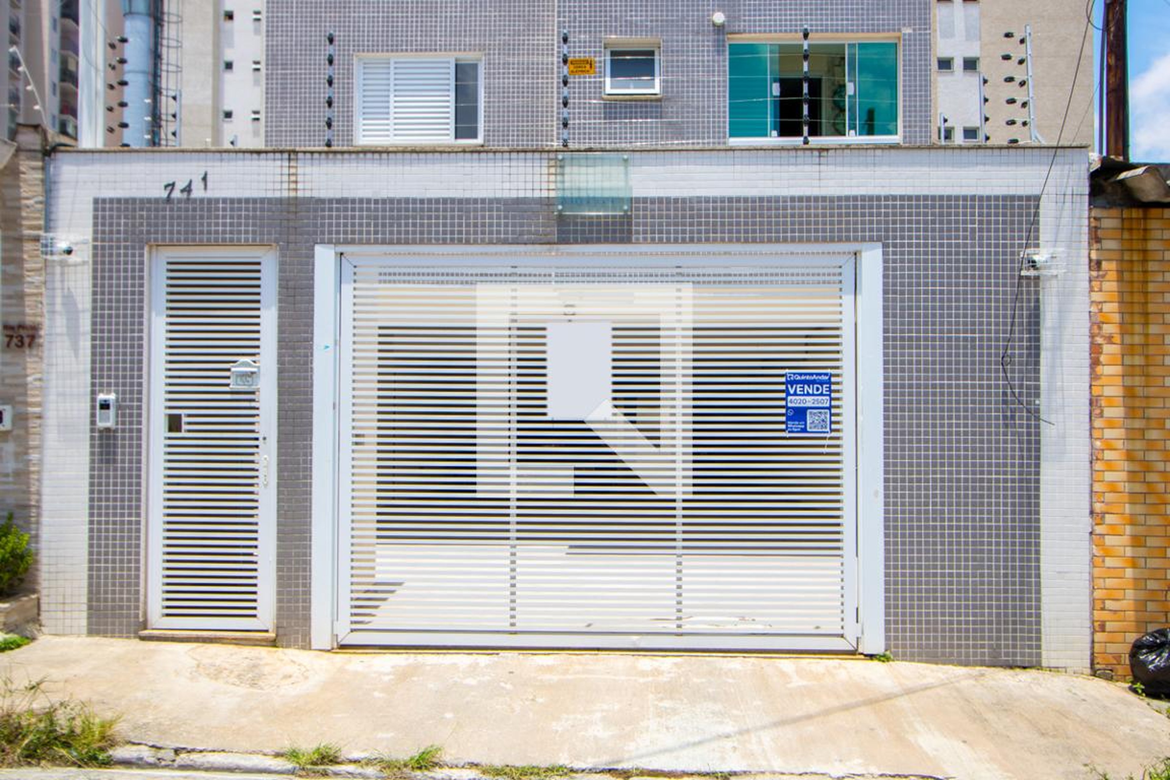 Fachada Condomínio em Rua Rio Preto, 741