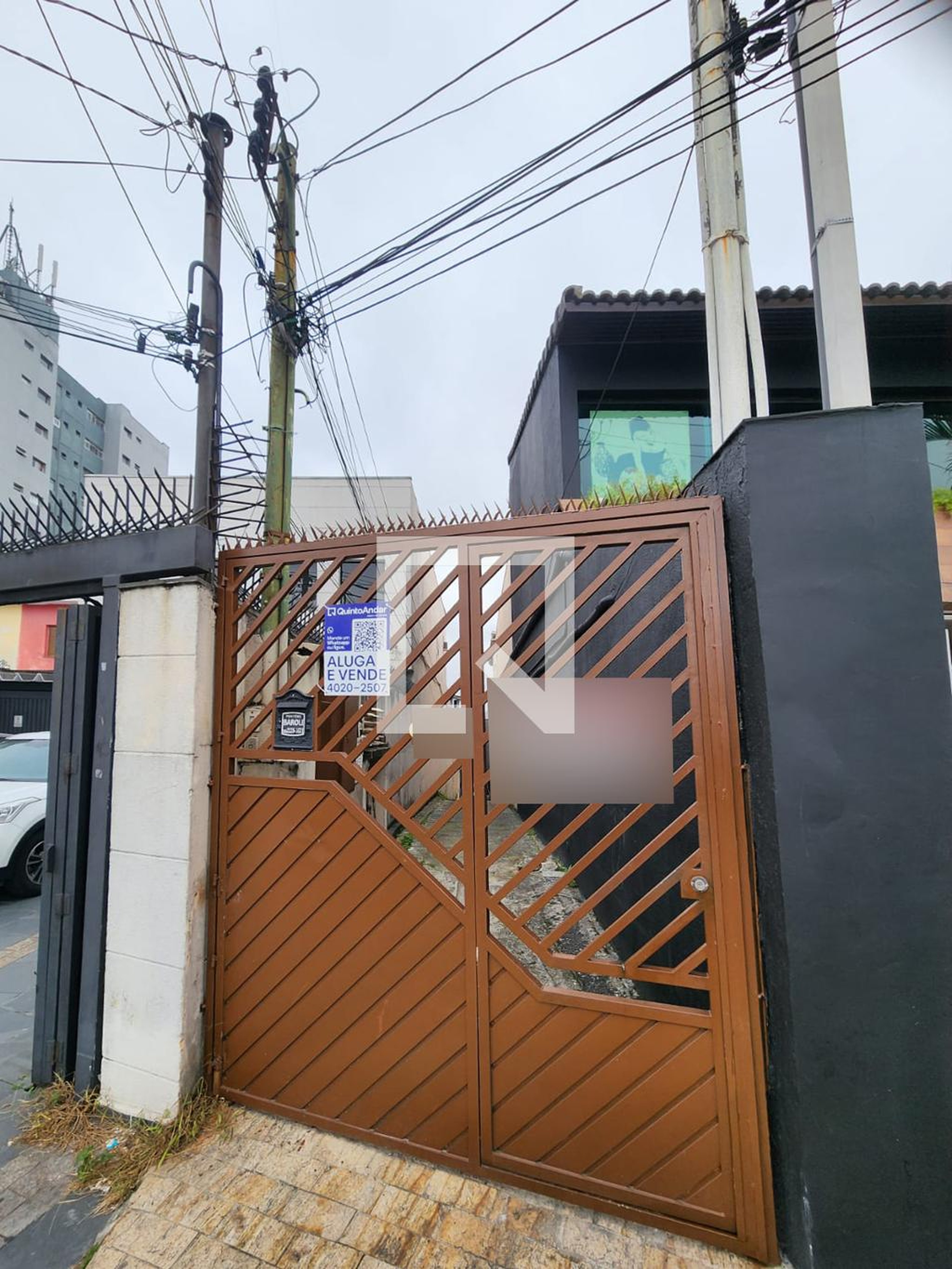 Fachada Condomínio em Rua Calandra, 292