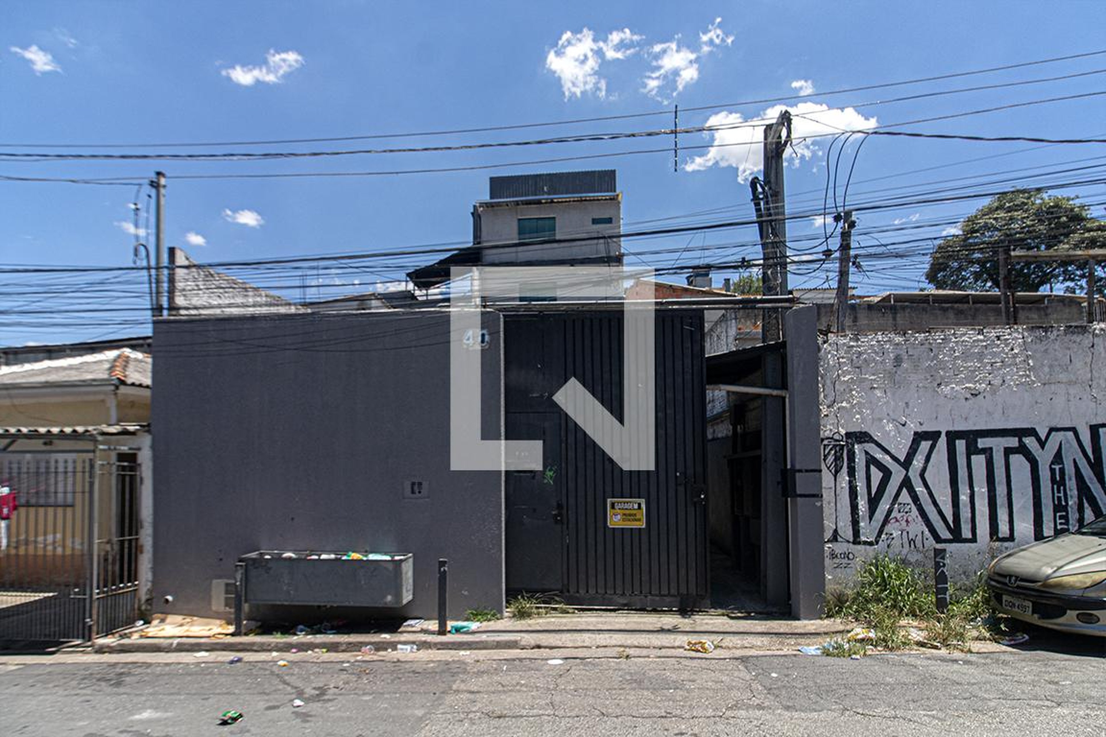 fachada Condomínio em Rua Paulo Martinez, 40