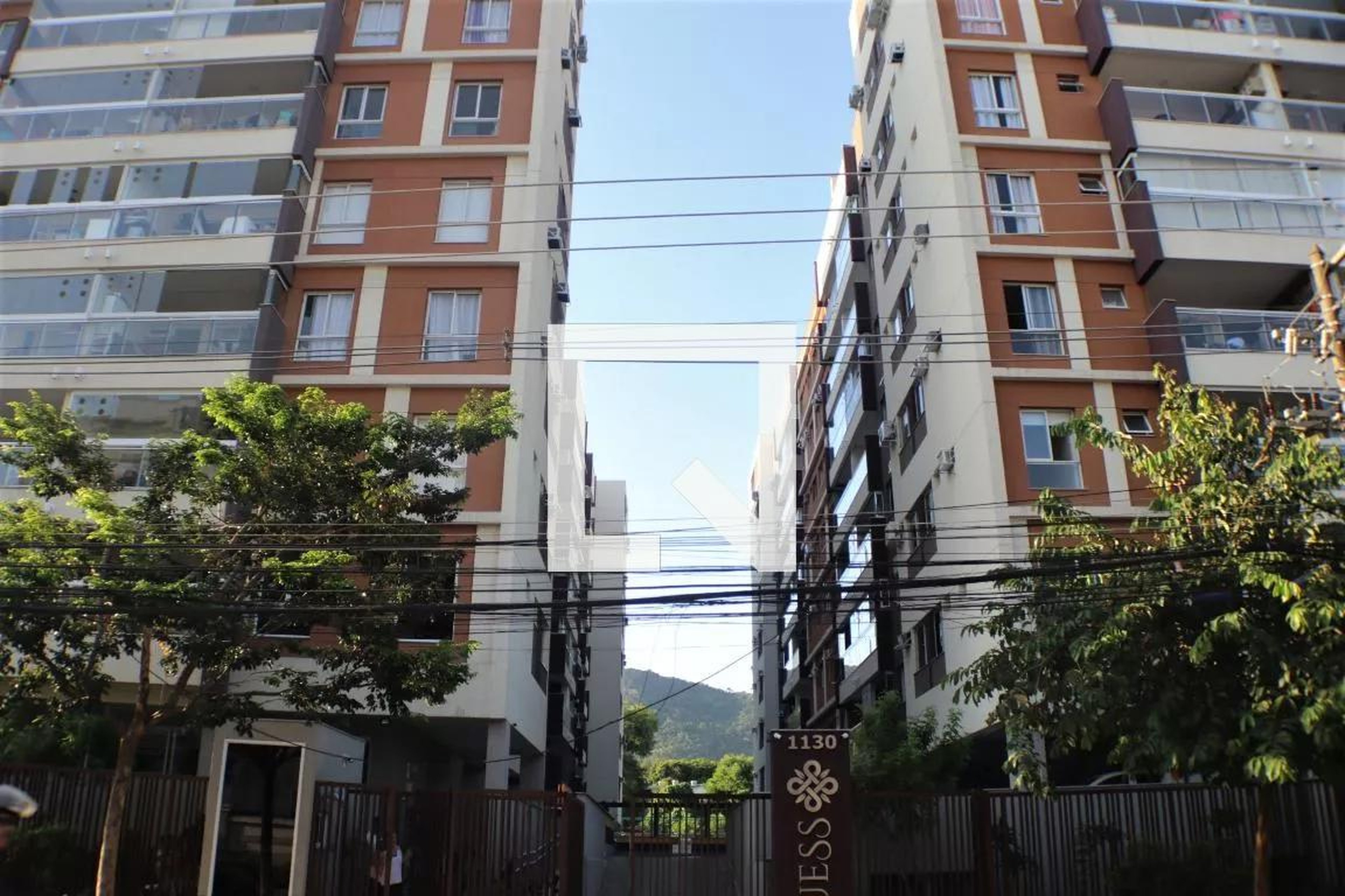 fachada Condomínio omio Guess