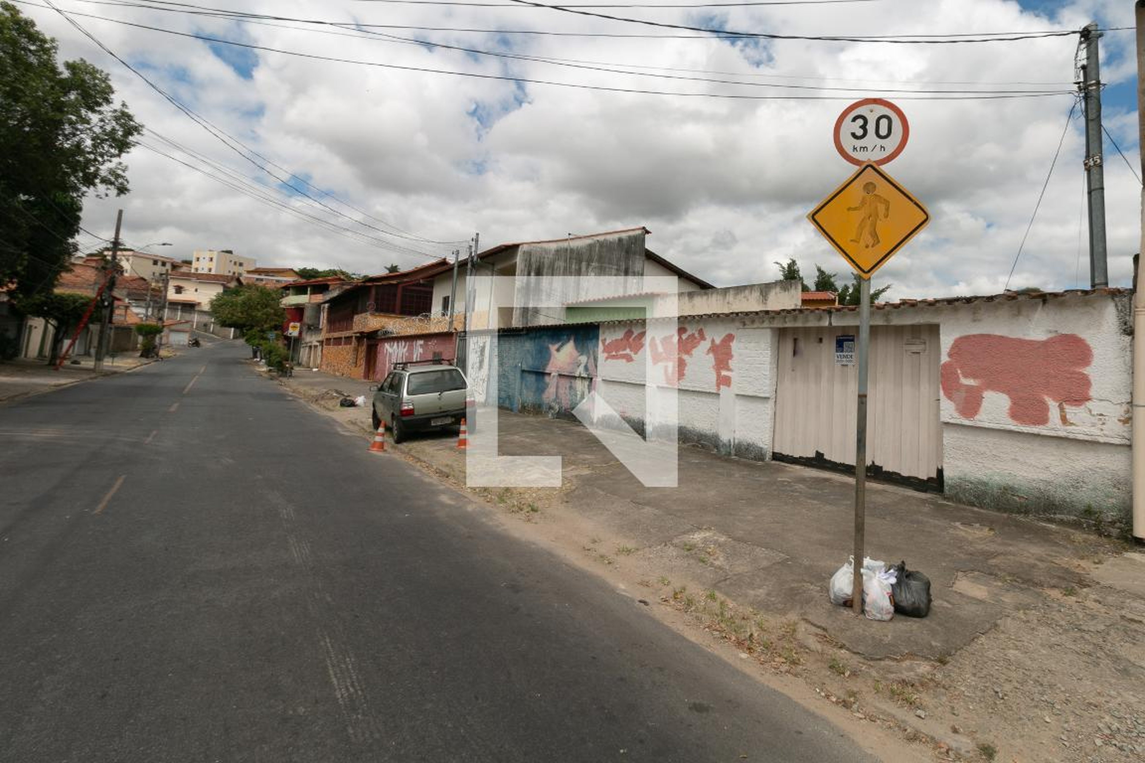 Fachada Condomínio em Rua Coronel Joaquim dos Santos, 545