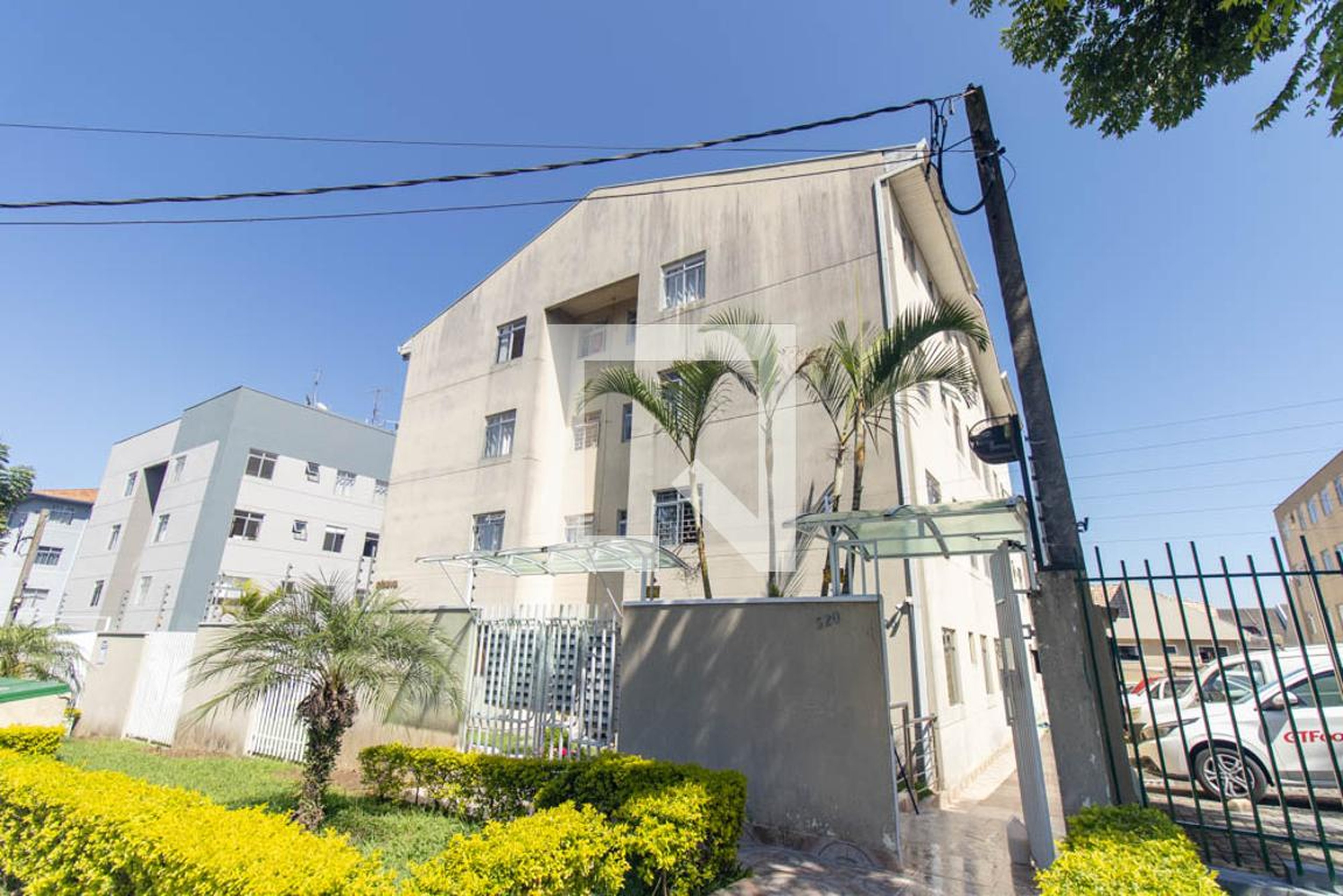 Fachada do Condomínio Condomínio Genova