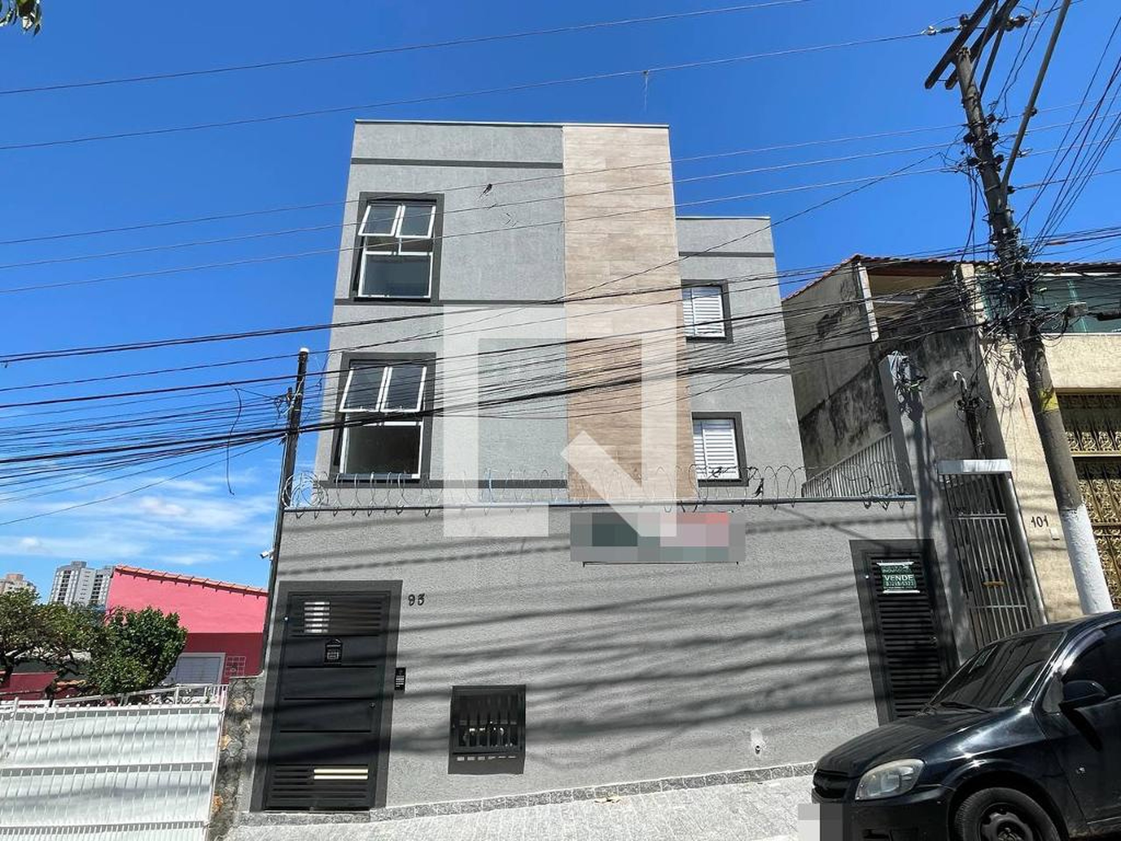 Fachada Condomínio em Rua Jorge O. Solanas, 95