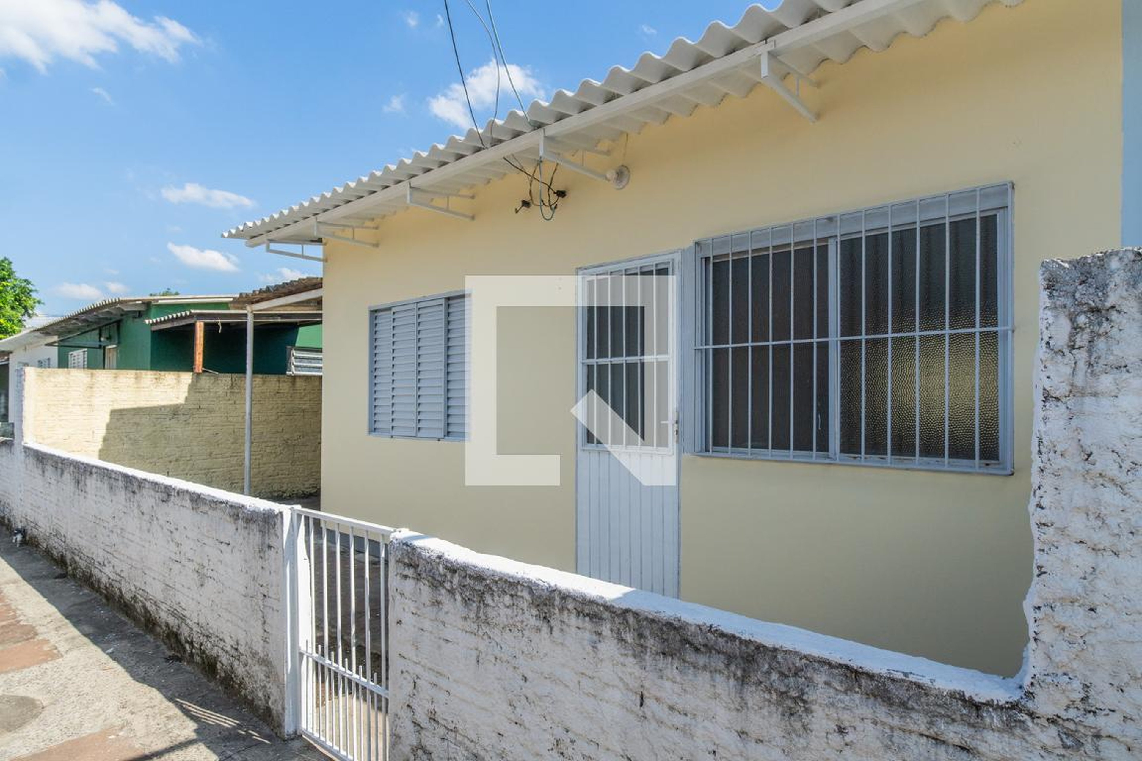 Fachada Condomínio em Rua Coronel Neves, 430