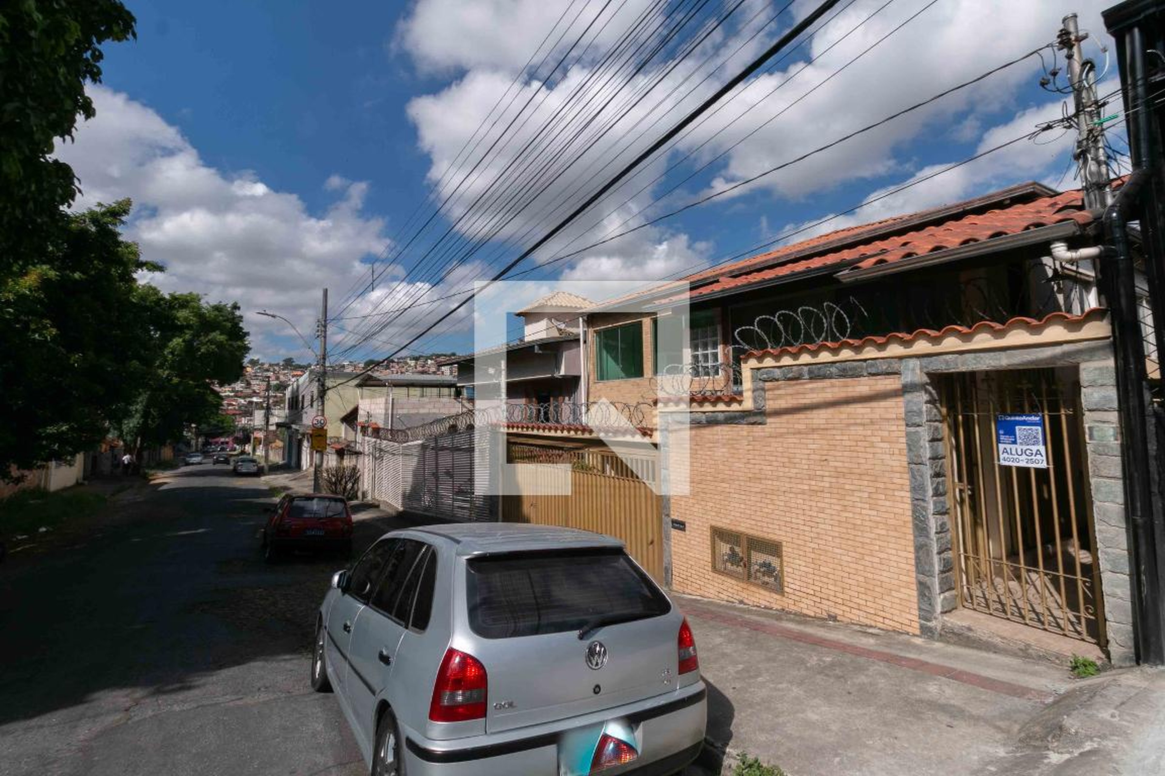 Fachada Condomínio em Rua Lírio do Vale, 62