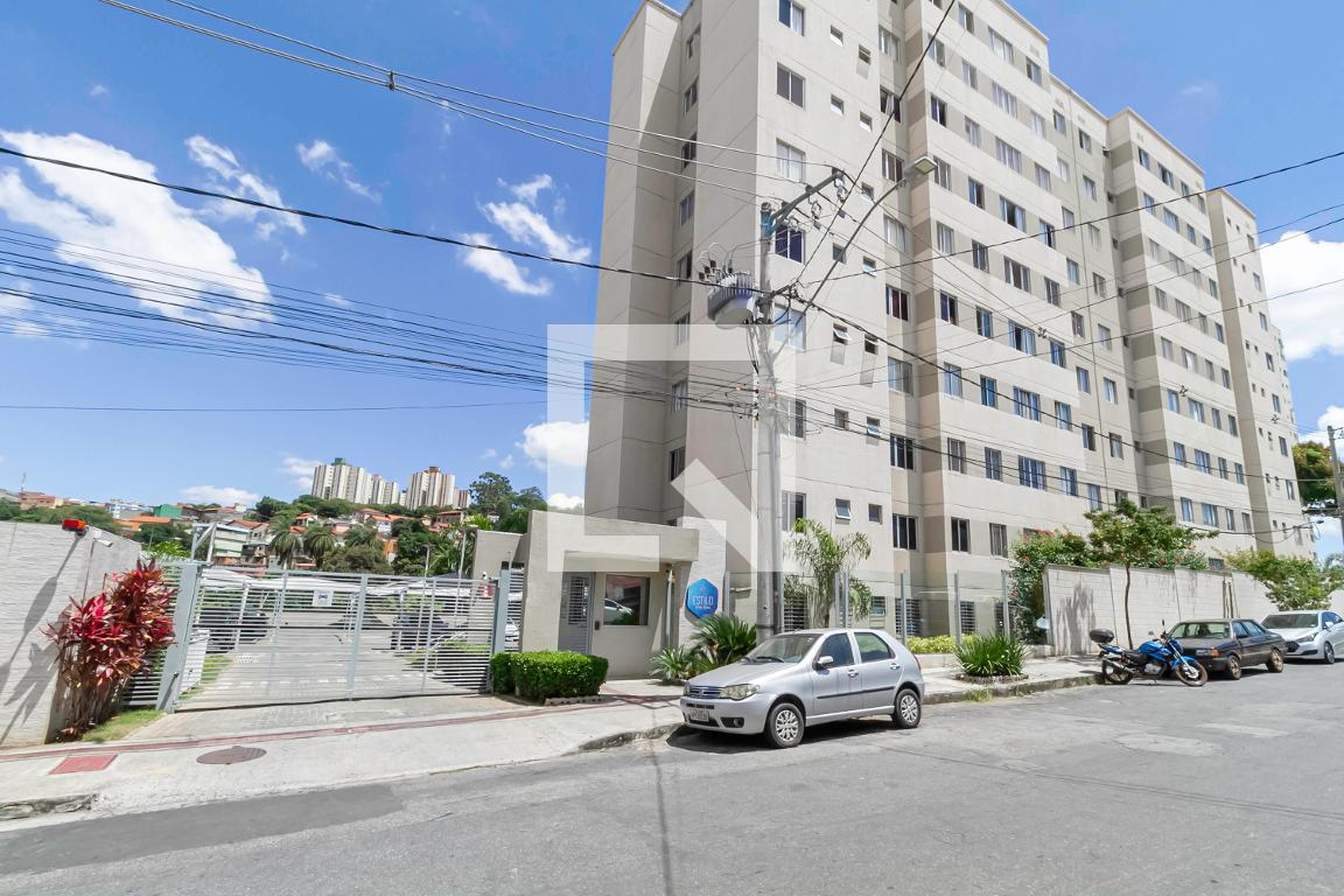 Fachada do Condomínio Condomínio Estilo Viver Bem