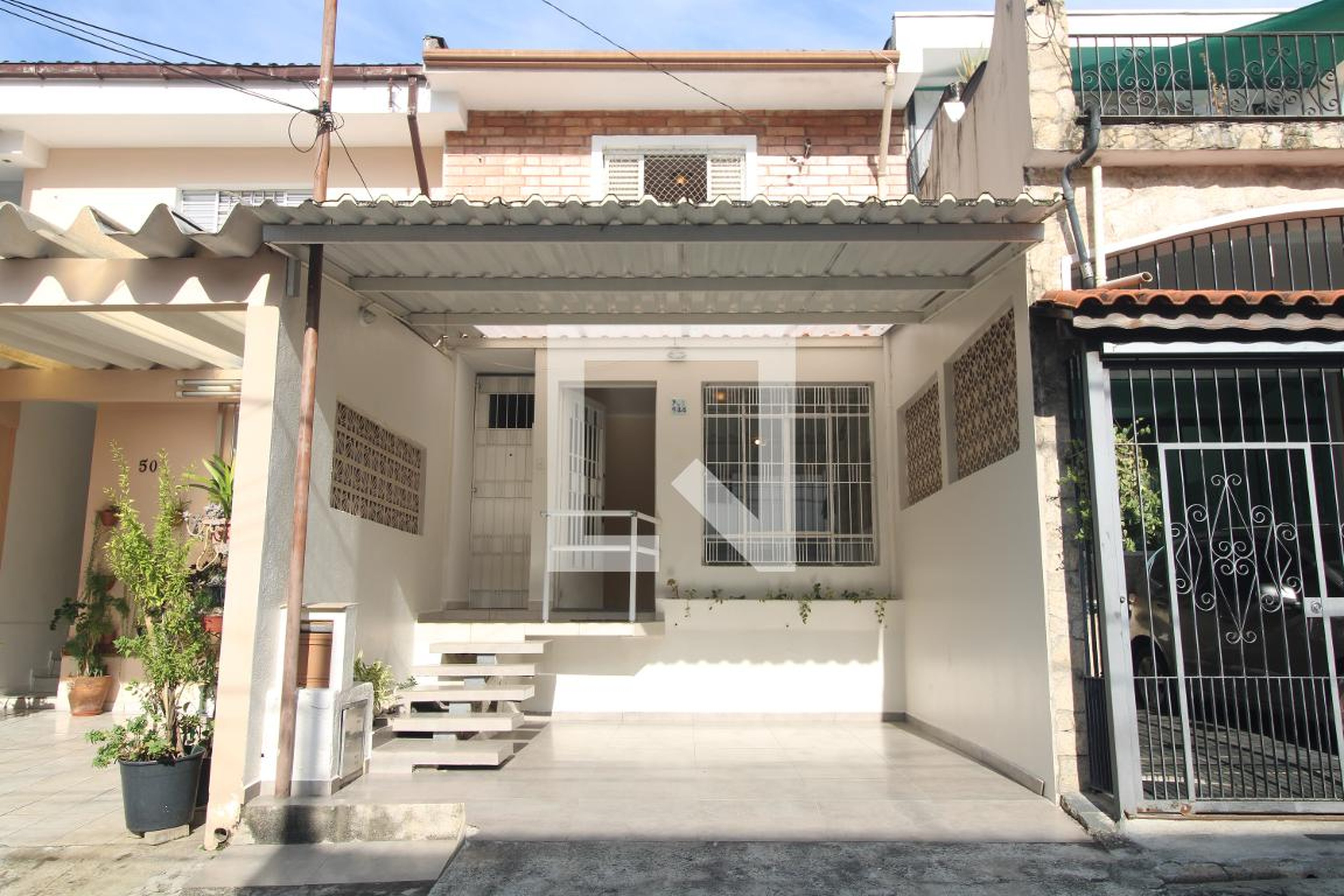 Fachada Condomínio em Rua Itubore, 44