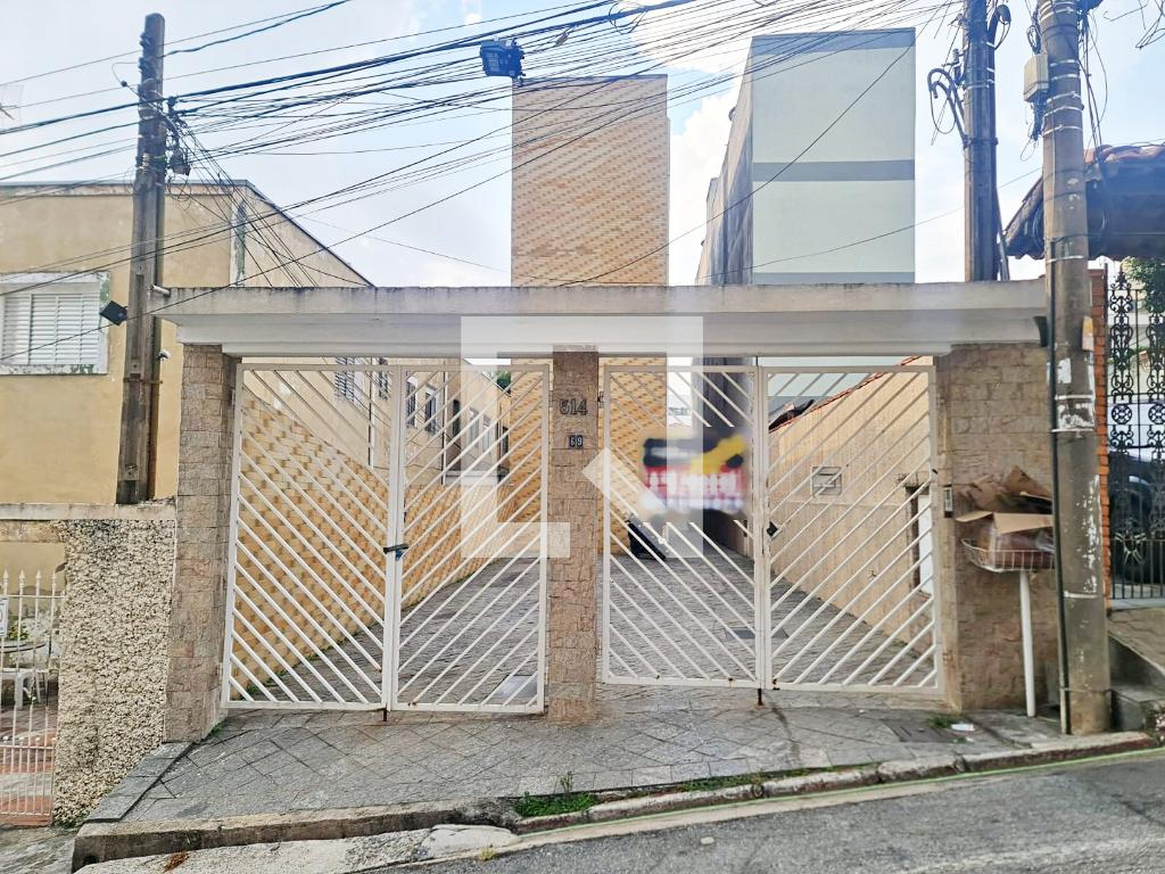 Fachada Condomínio em Rua Célso, 69