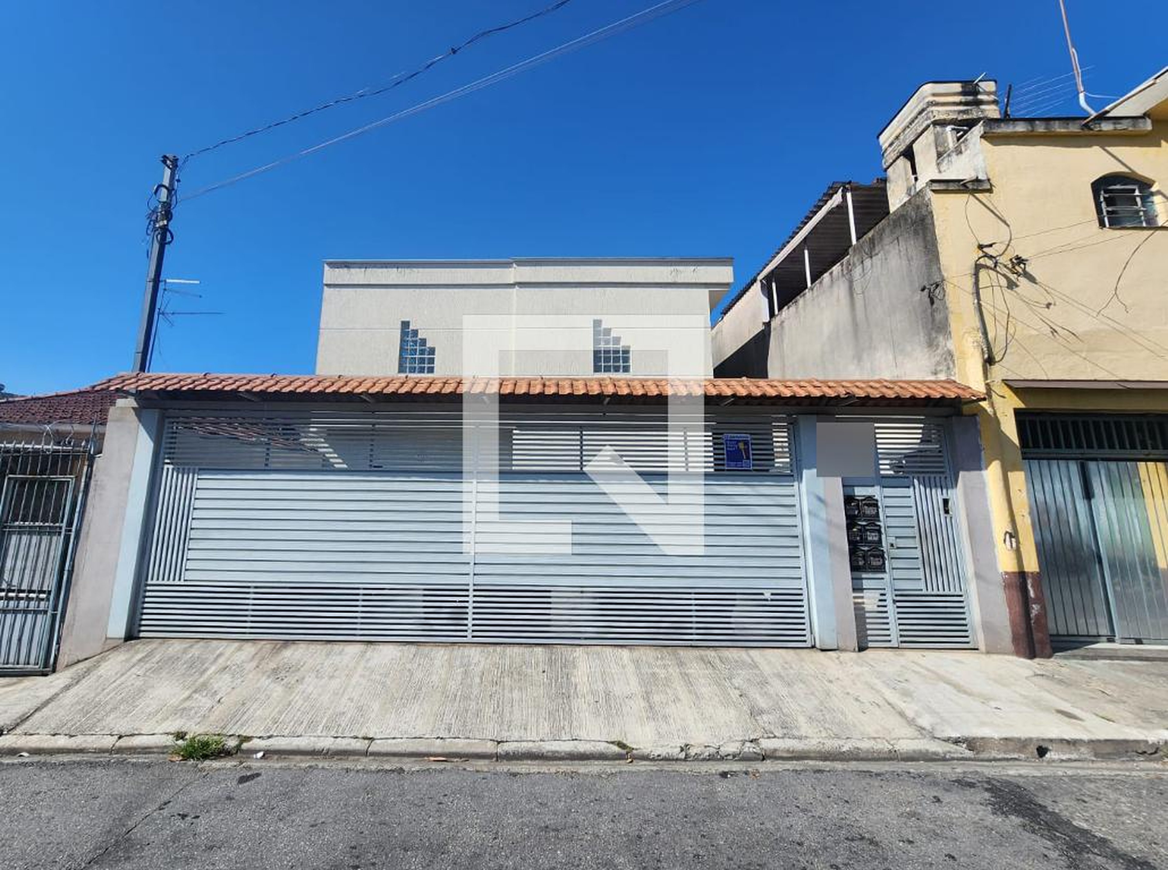 Fachada Condomínio em Rua Astecas, 258