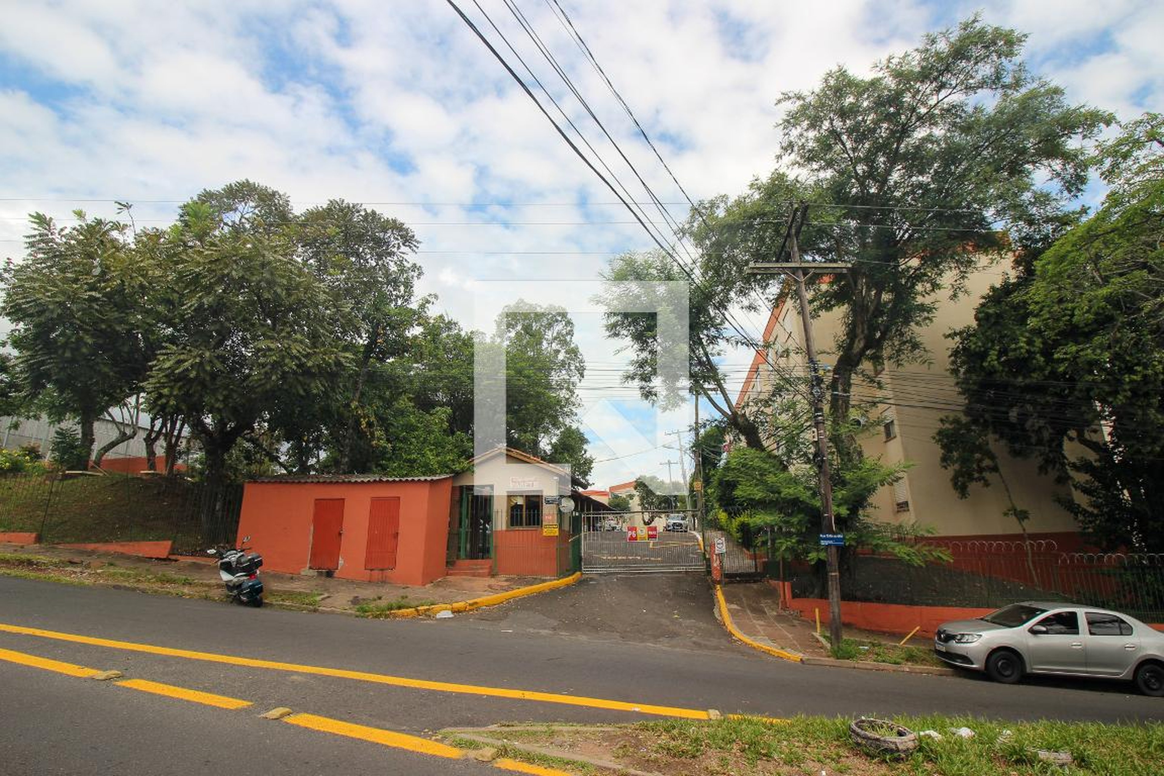 Fachada do condomínio Condomínio Paretê