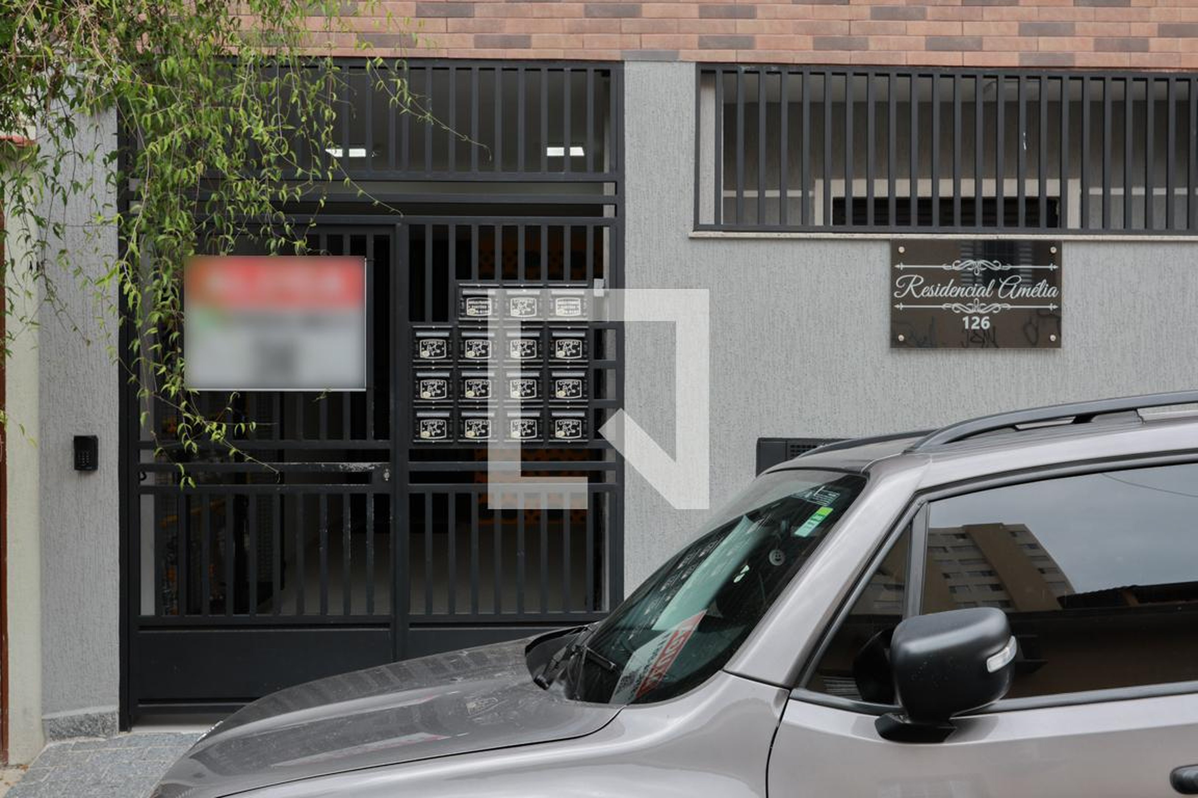 Fachada do condomínio Condomínio Amélia