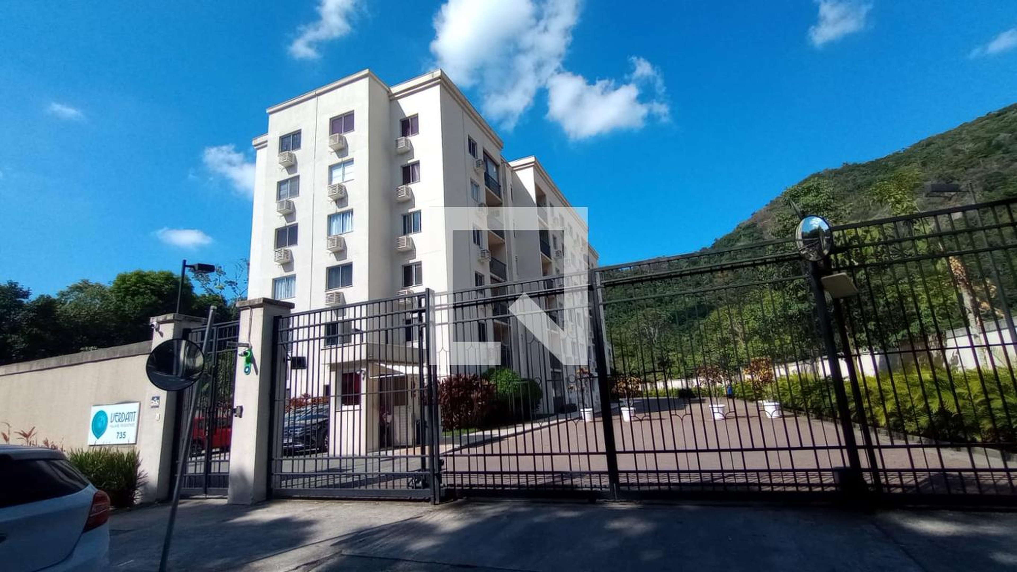 Fachada do Condomínio Condomínio Verdant Village