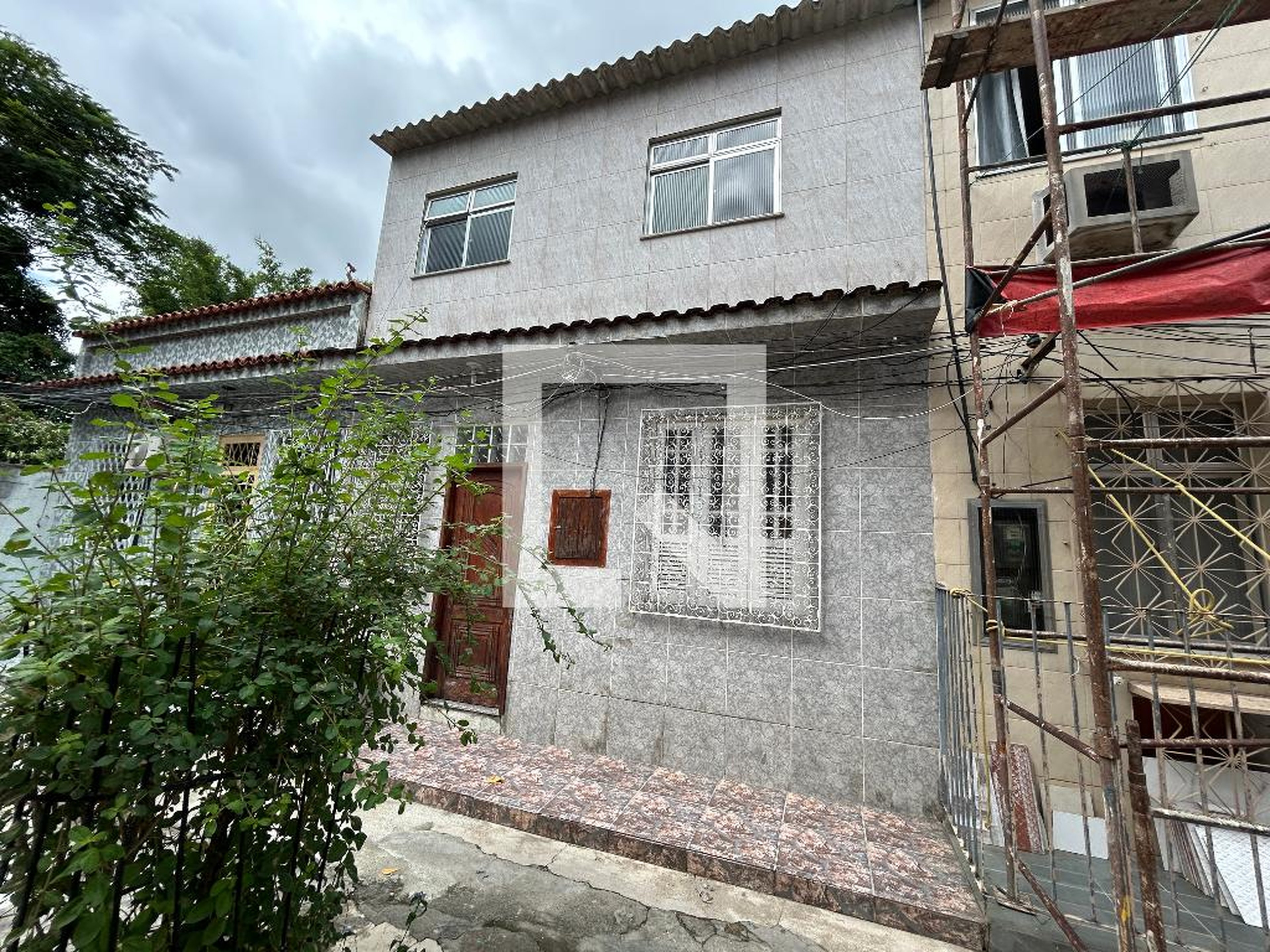 Fachada Condomínio em Rua Clarimundo de Melo, 171
