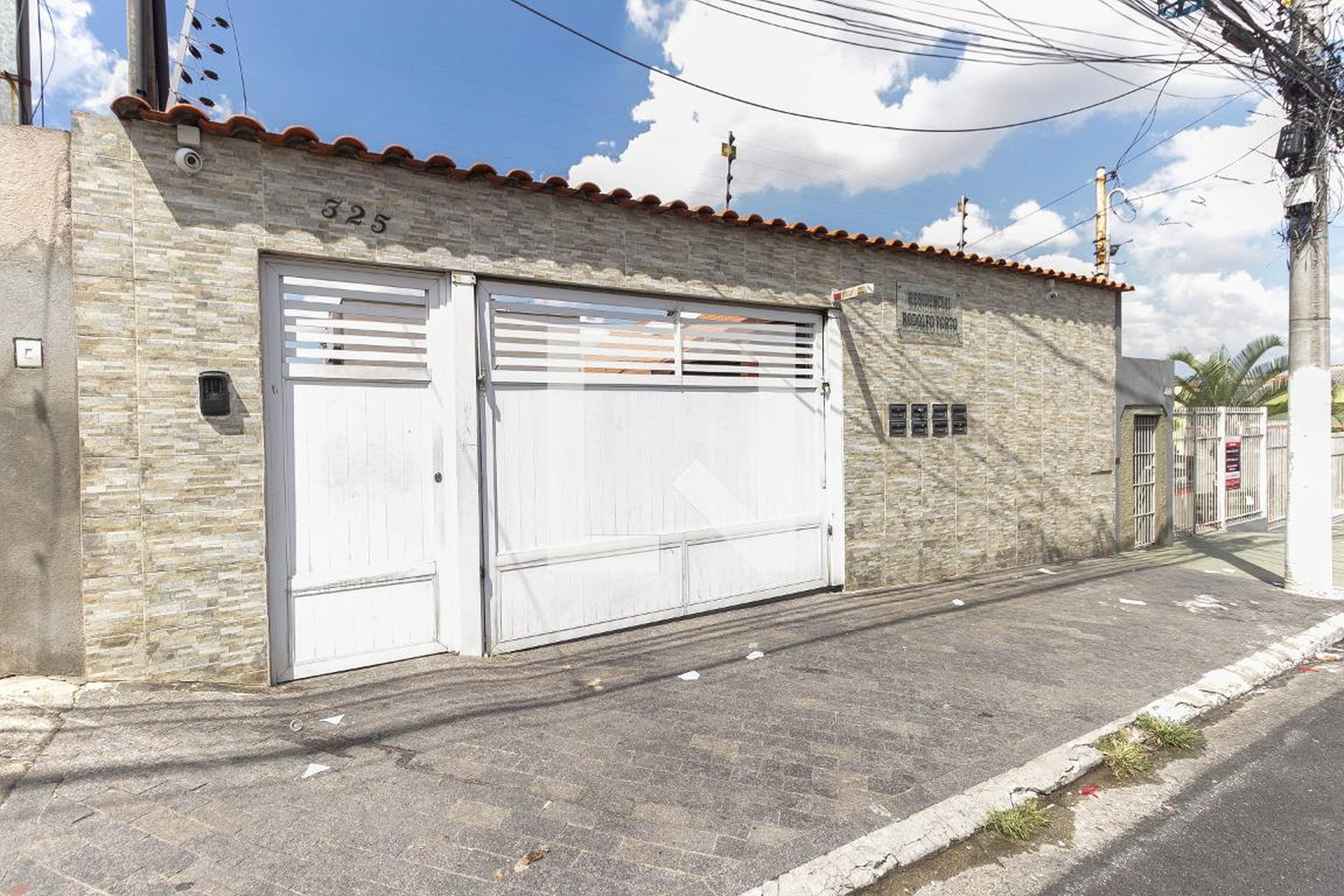 Fachada Condomínio em Rua Coronel Rodolfo Porto, 325