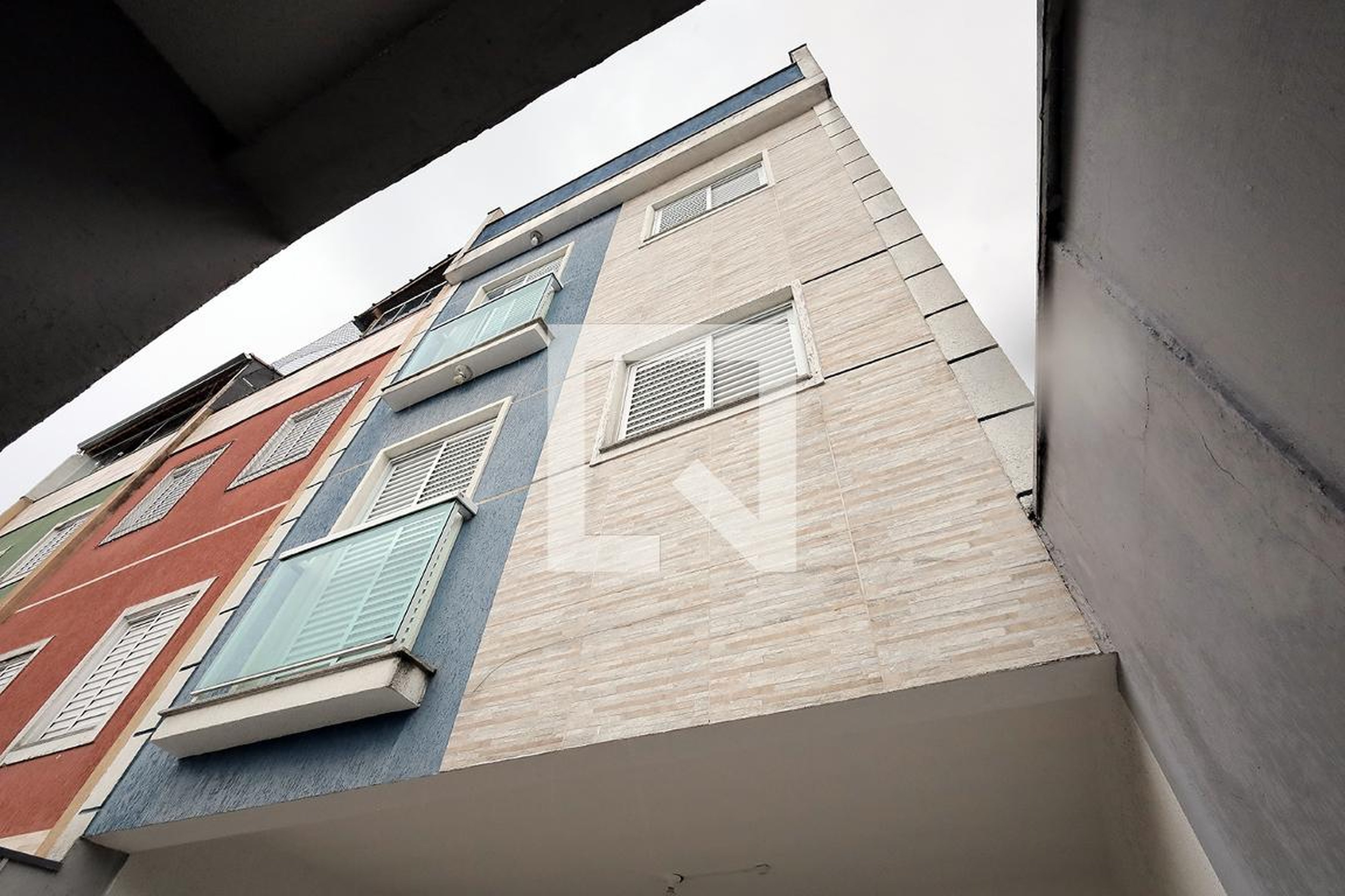 Fachada Condomínio em Rua Hipólito da Costa, 58