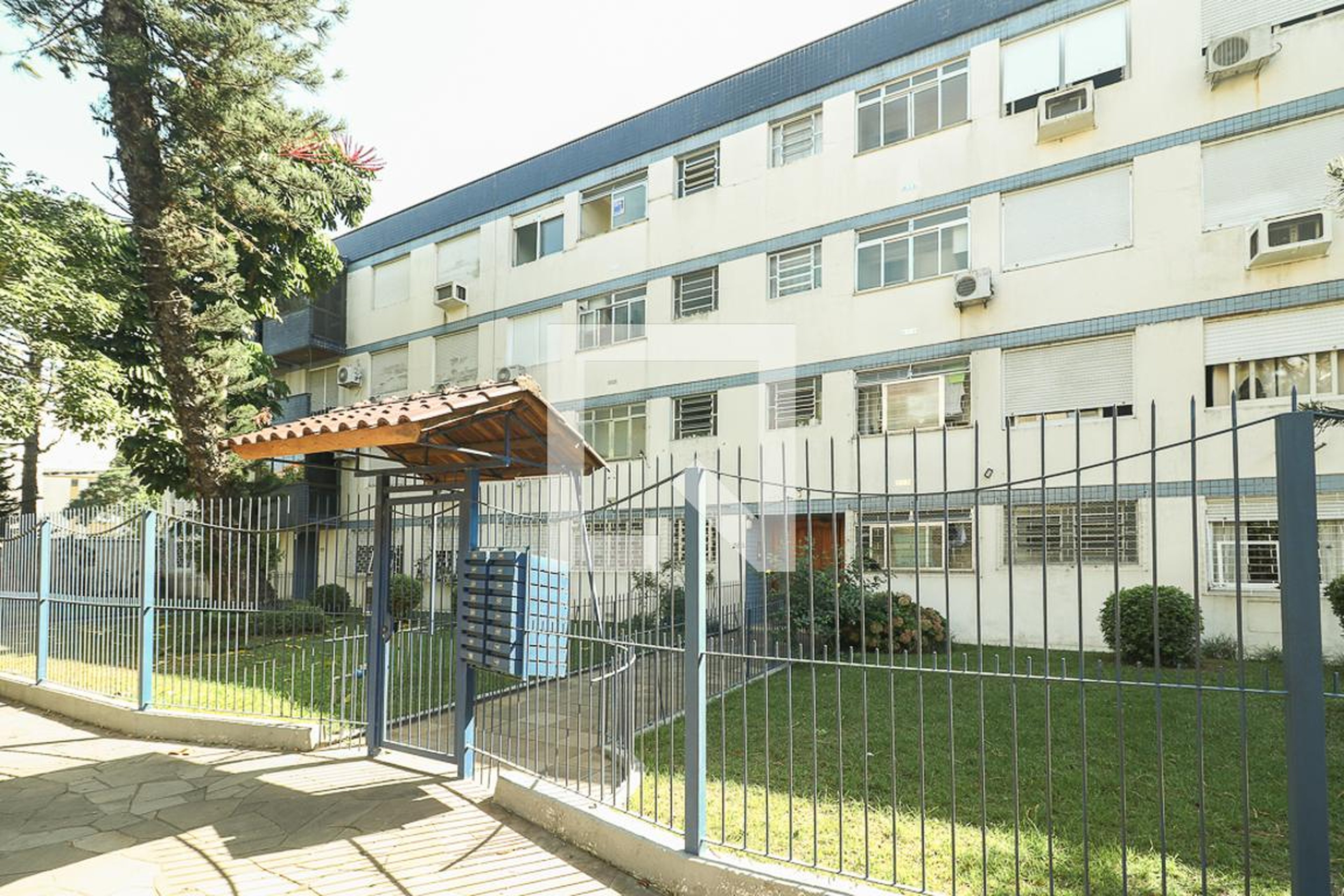 Fachada Condomínio em Rua Cipó, 286