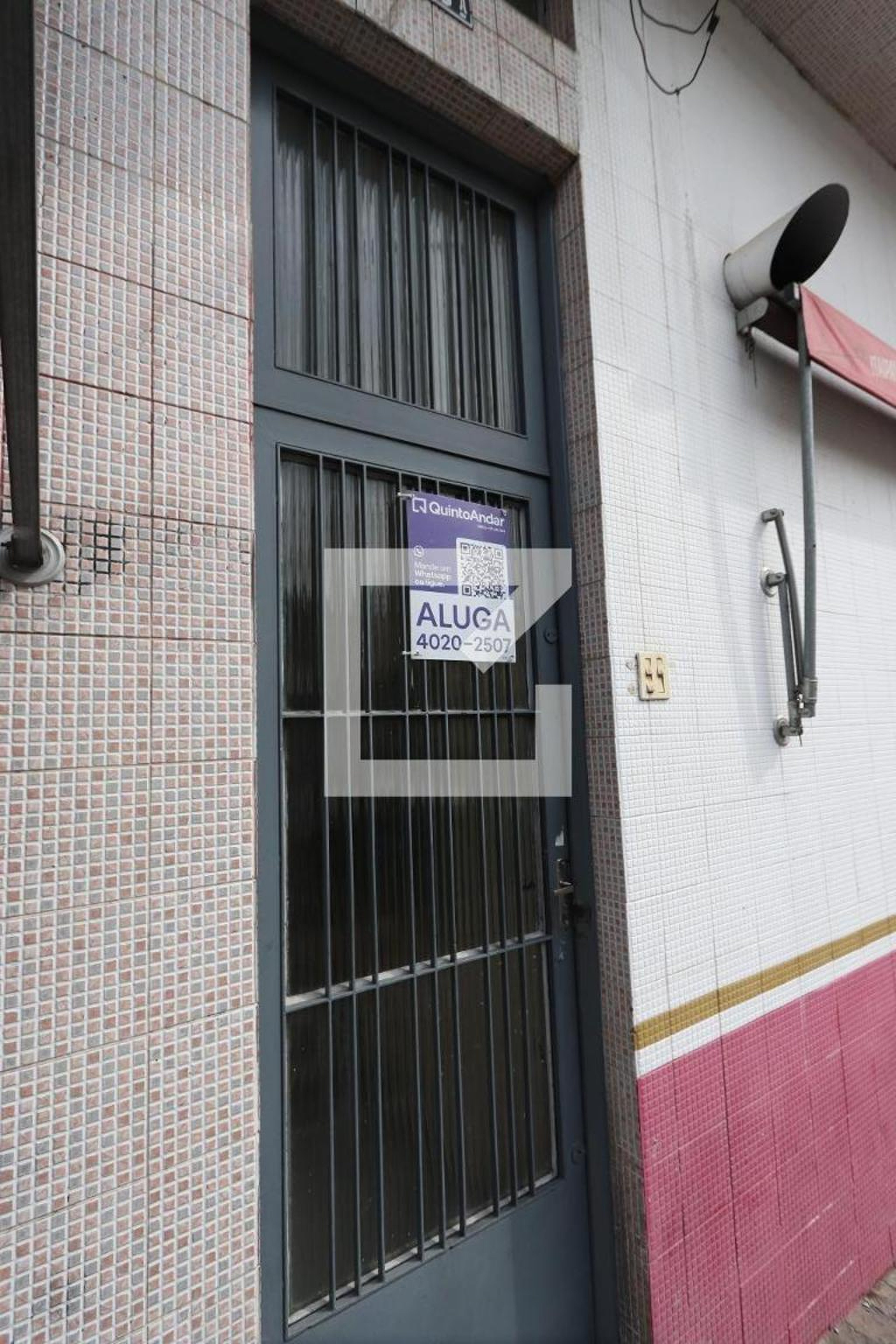 Fachada Condomínio em Rua Algarobo, 13