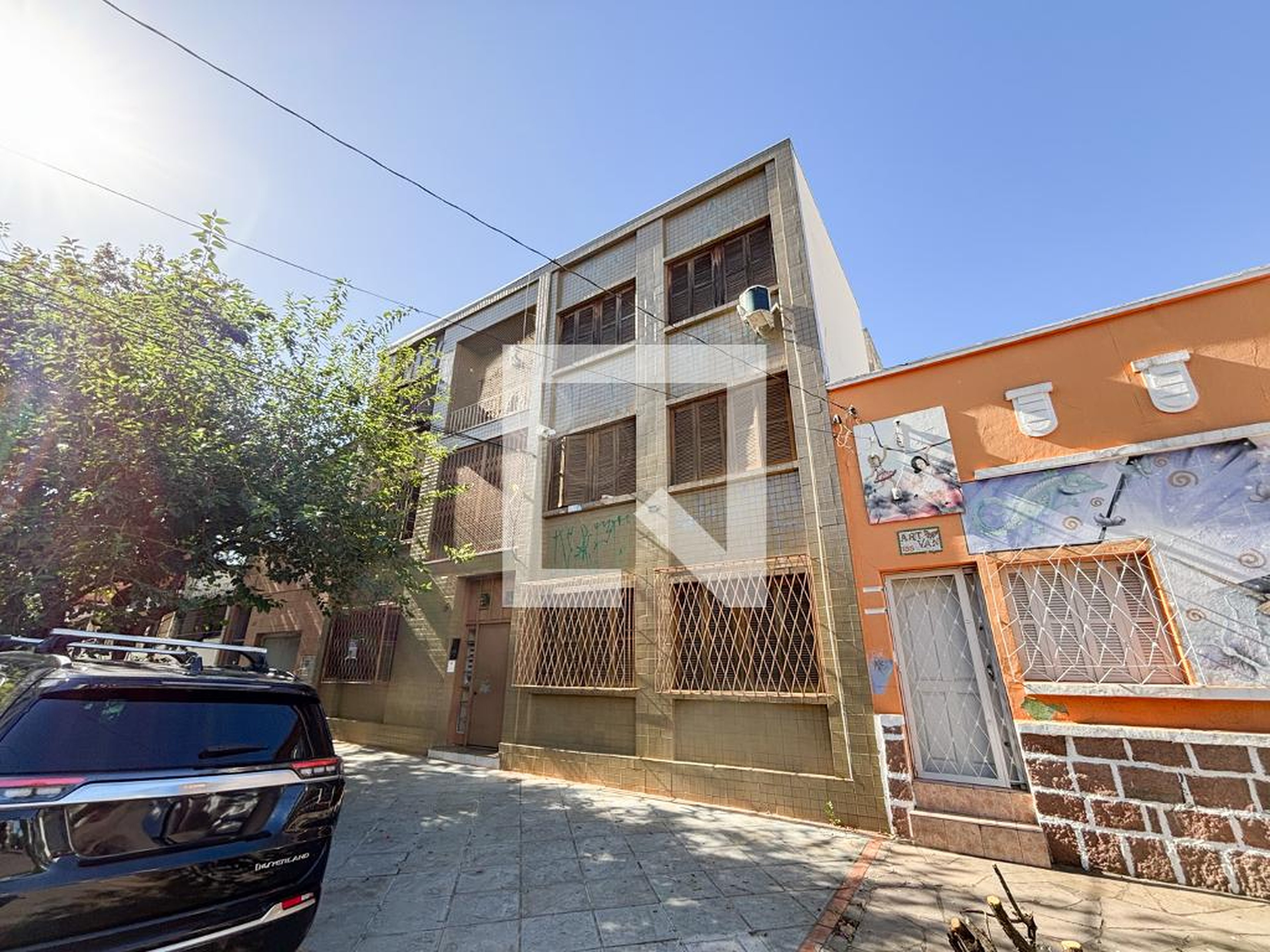 Fachada Condomínio em Rua Lobo da Costa, 165