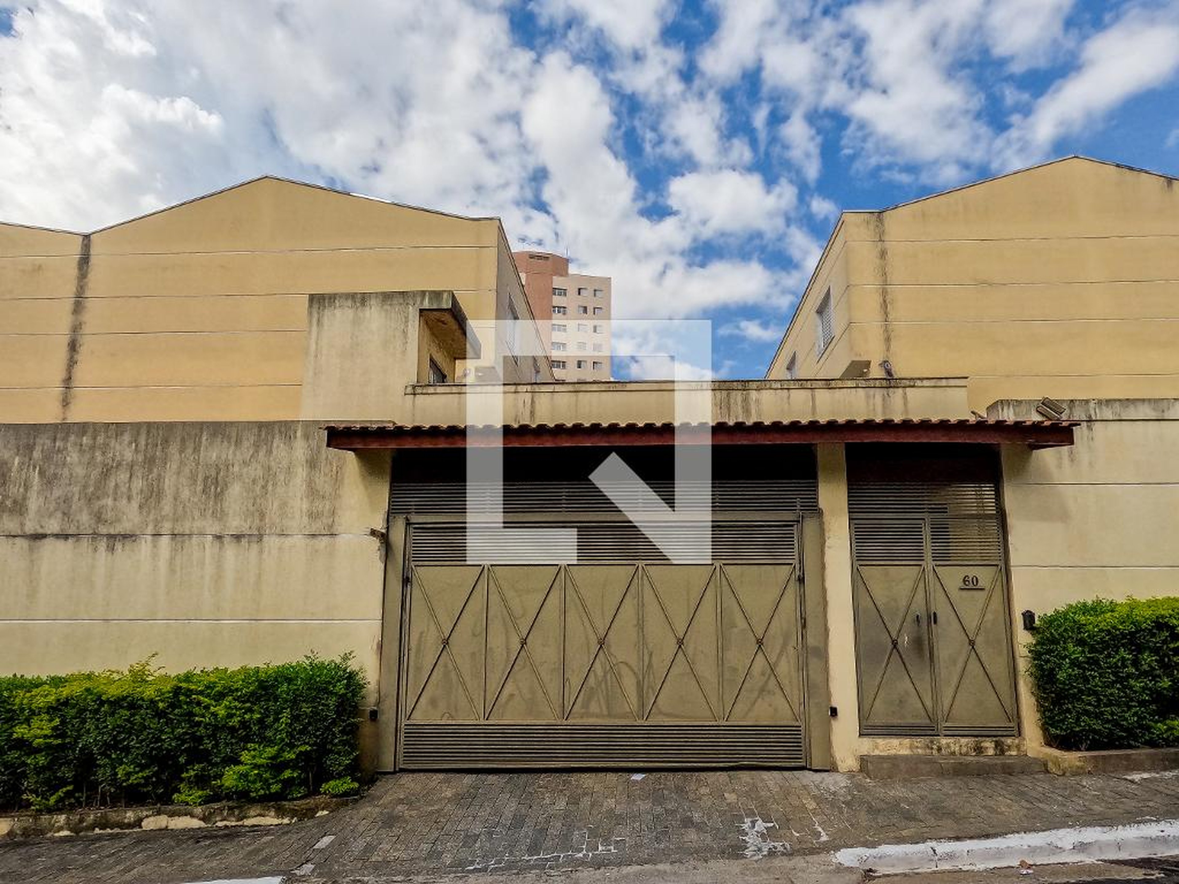 Fachada Condomínio em Rua Benedito Augusto Ferreira, 60