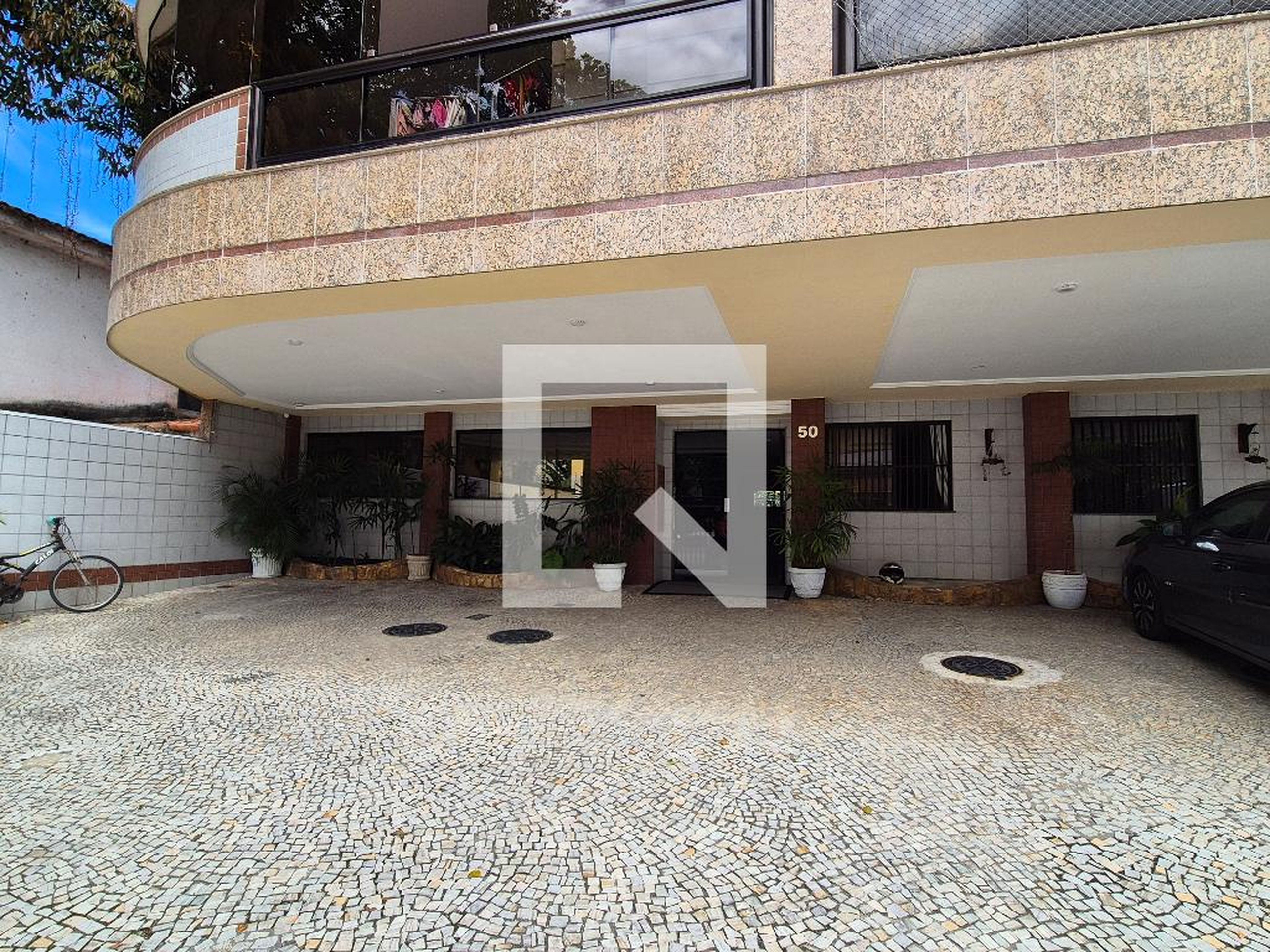 Entrada Condomínio em Rua Agenor Rabello, 50