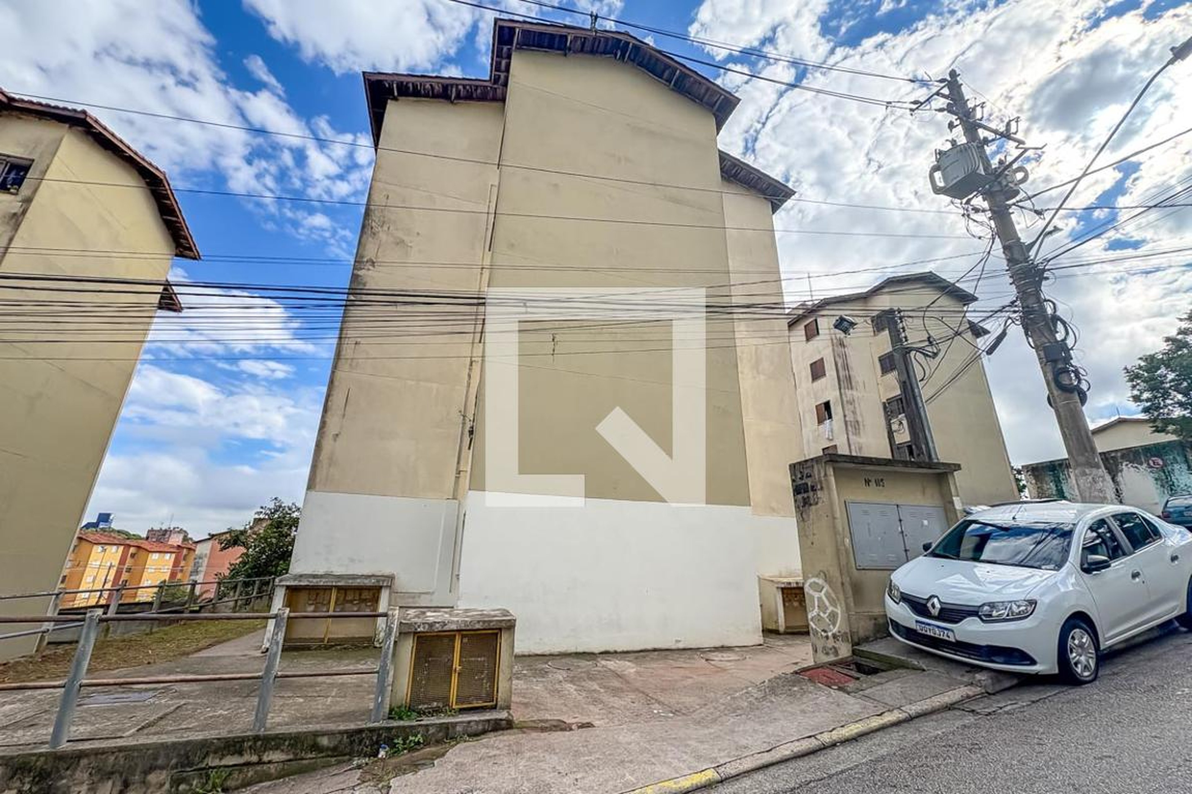Fachada Condomínio em Rua Beta Dragone, 105