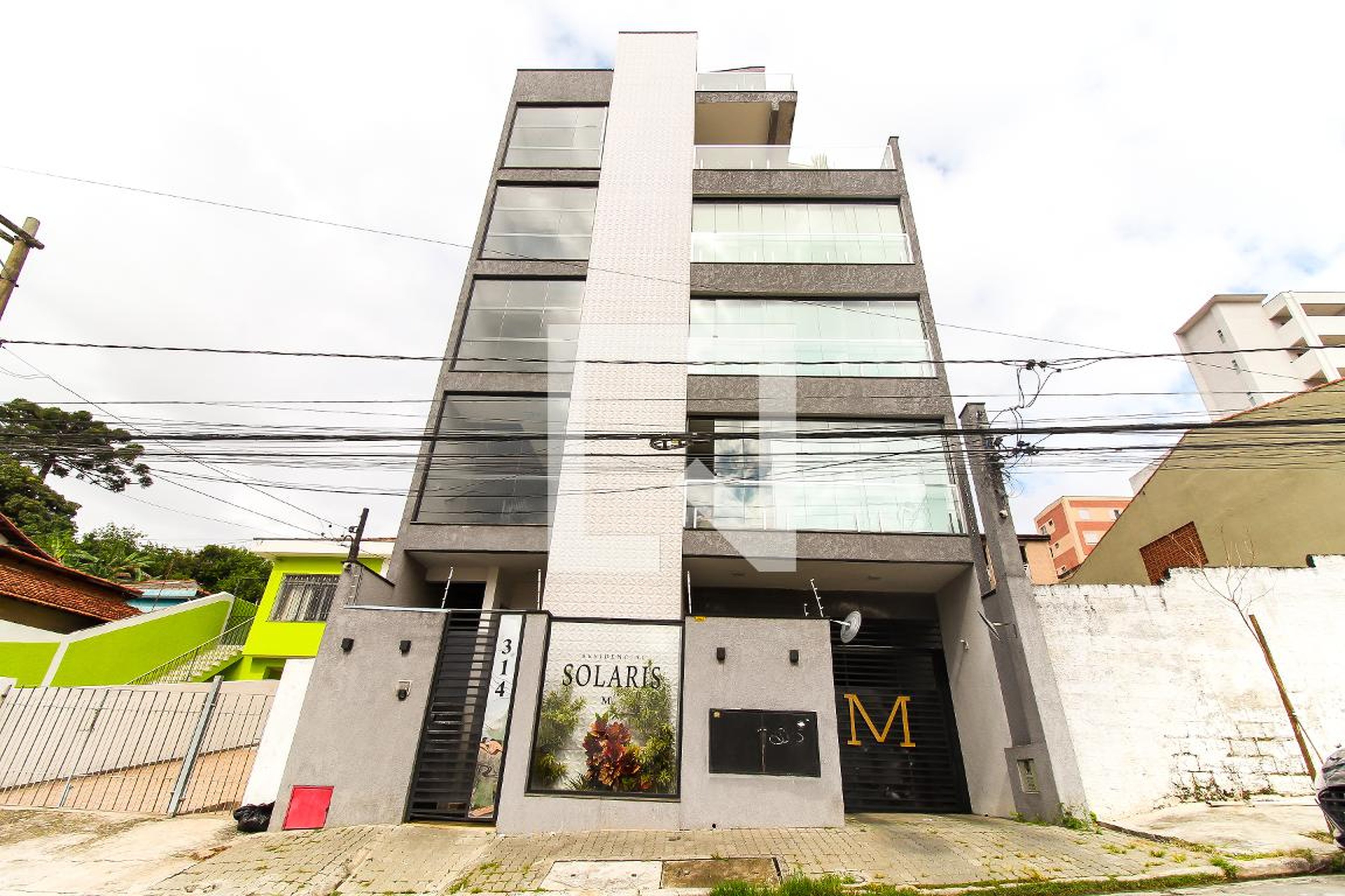 Fachada Condomínio em Rua Victório Santim, 314