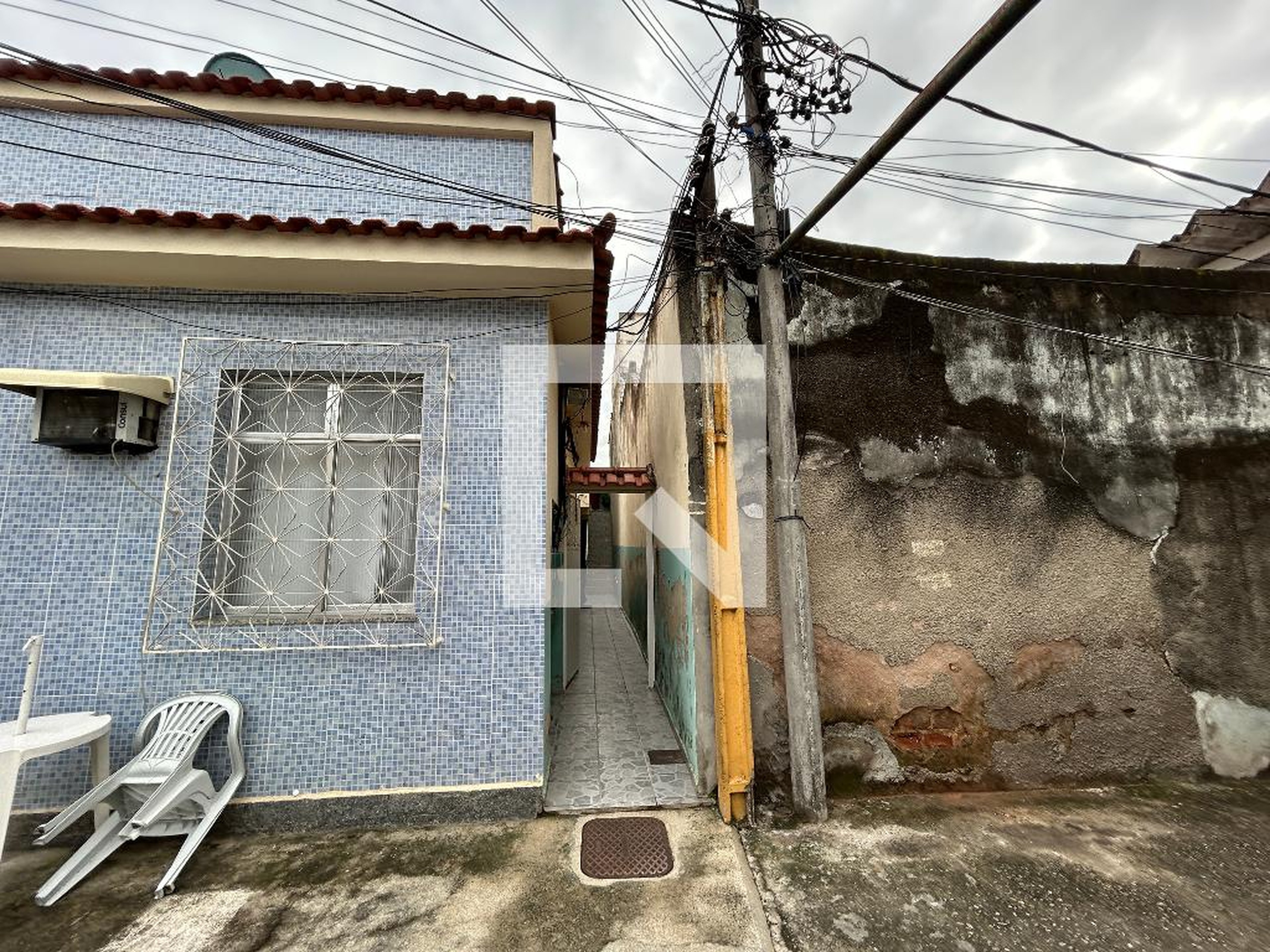 Fachada Condomínio em Rua Guineza, 49