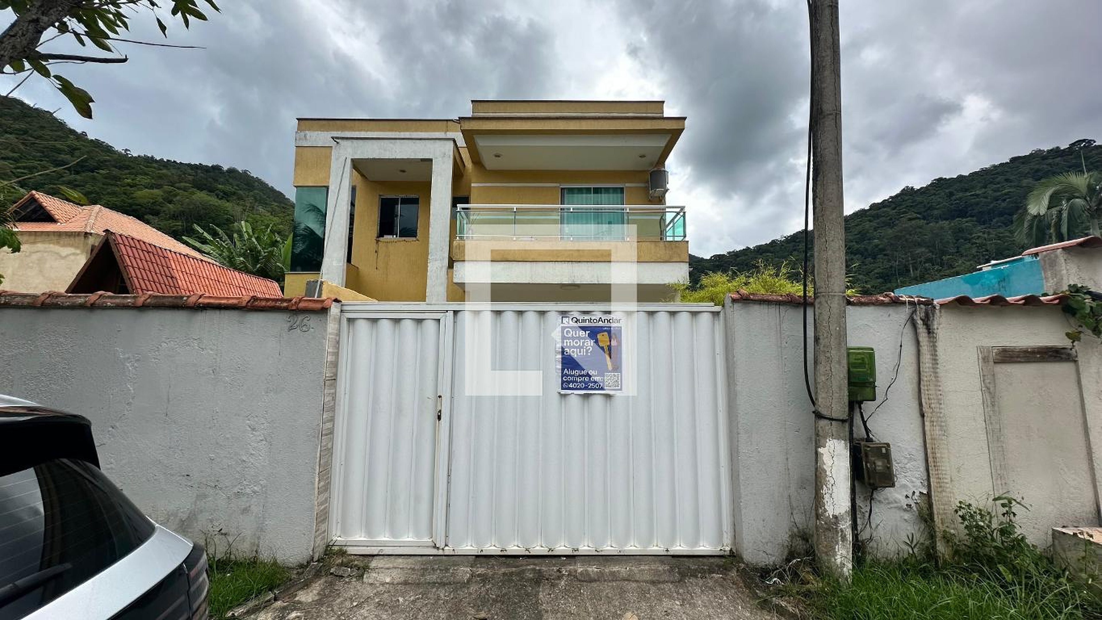 Fachada Condomínio em Rua Violetas, 26